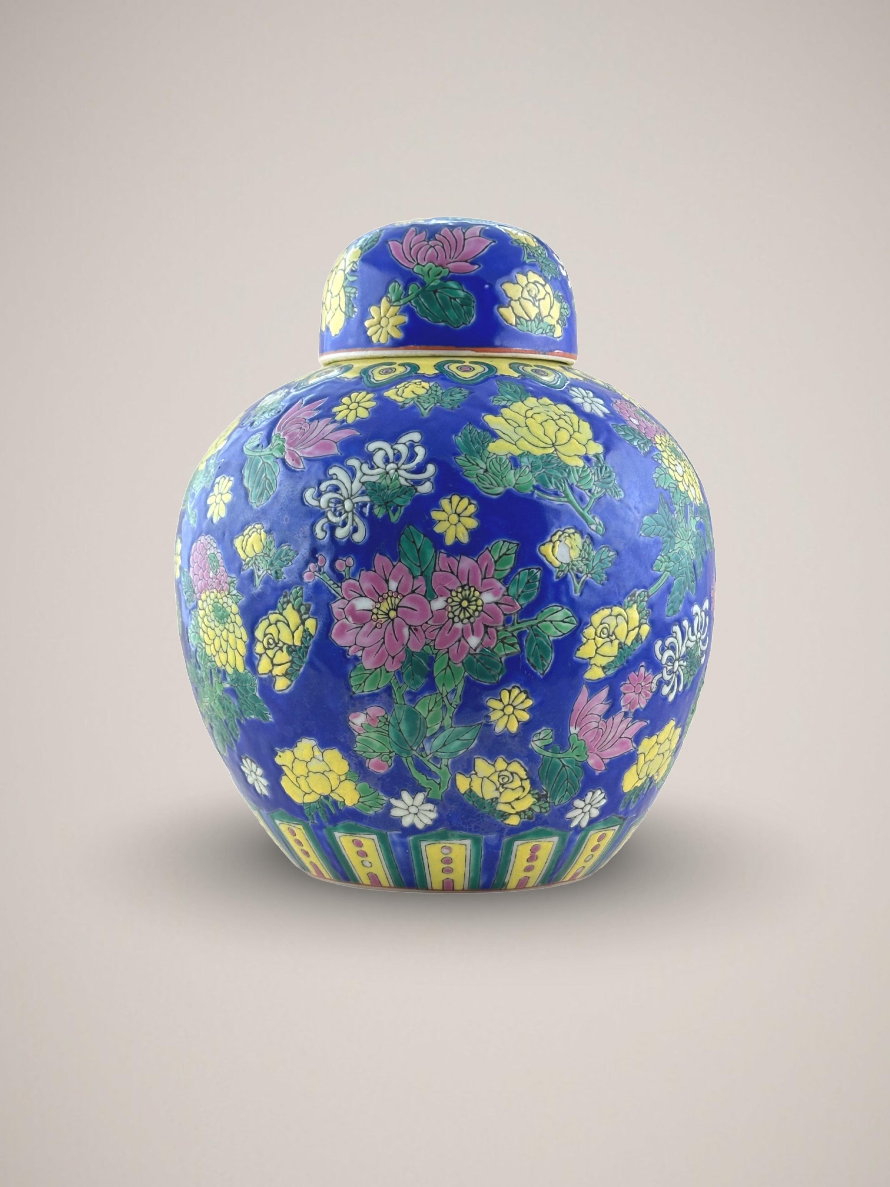 A large vintage 'Straits style' ginger jar. Crafted in China towards the latter half of the 20th Century, around the 1970s

Handcrafted in fine Chinese porcelain and emboldened with a vivid palette of enamel tones. It is adorned with chrysanthemum