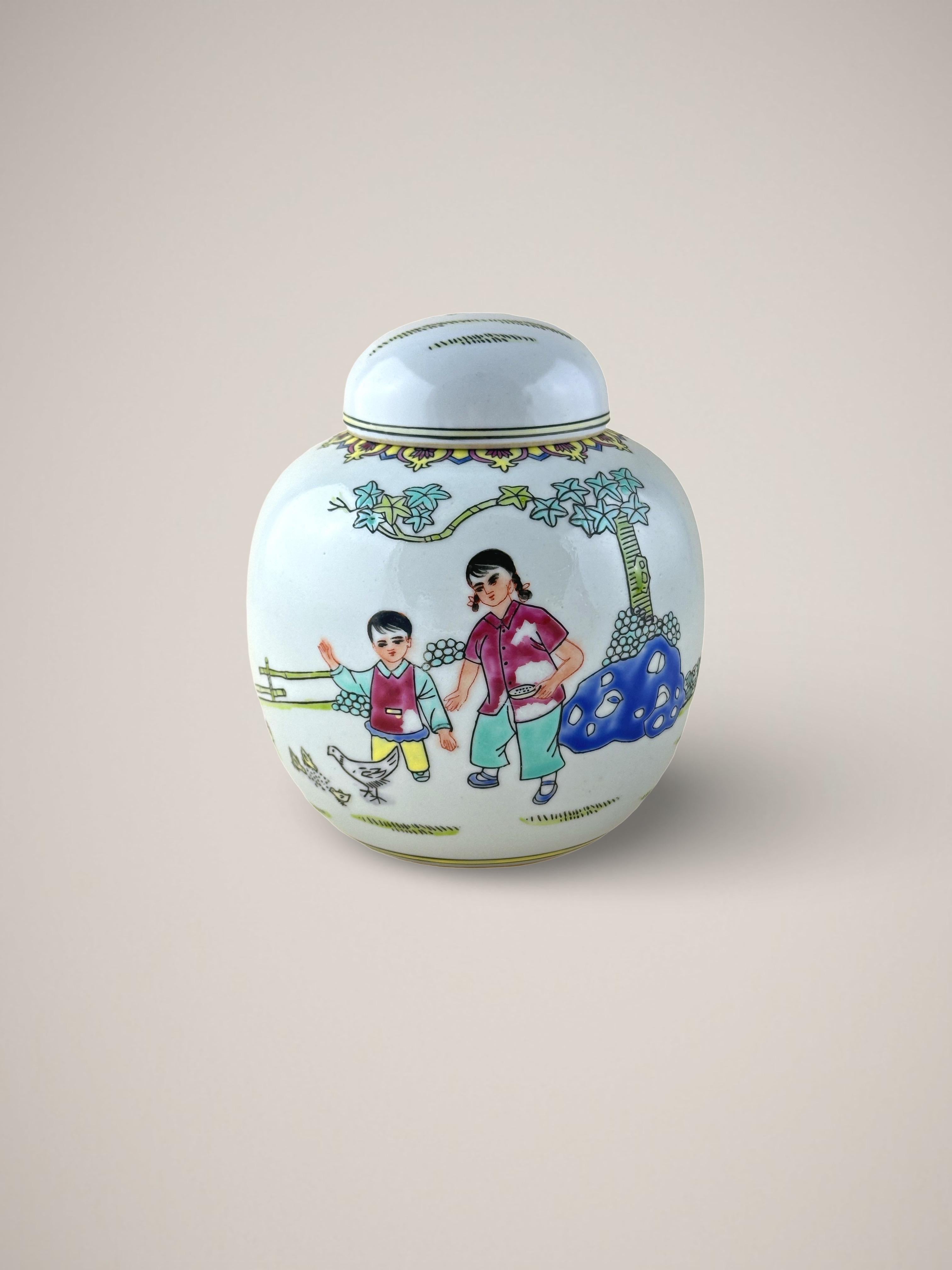 A colorful vintage ginger jar, crafted in Jingdezhen, China in the 1970s, is a beautiful example of wucai porcelain. 

Decorated with a vibrant figural scene depicting a mother and child feeding birds in a natural setting. Bold tones of ultramarine