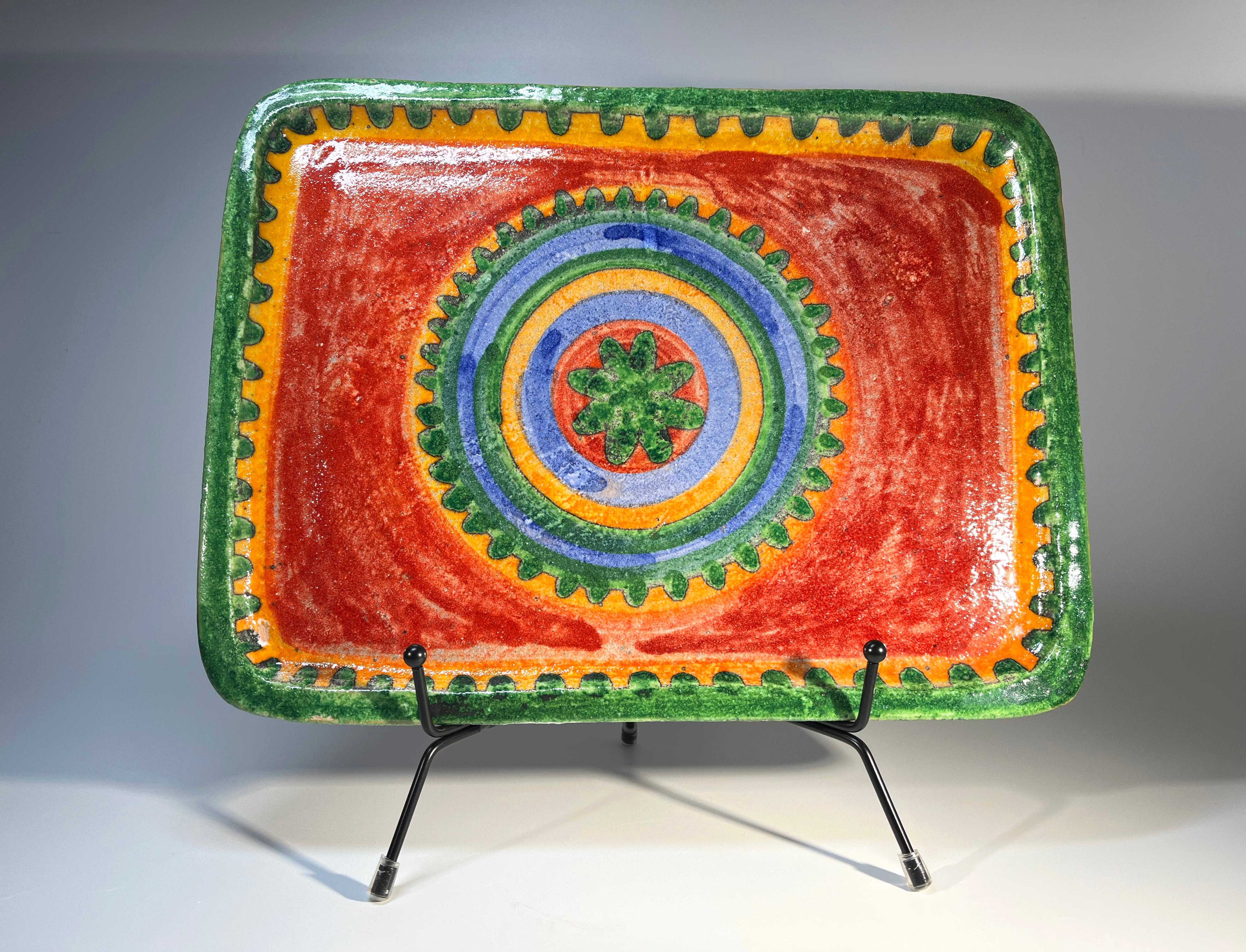 Colourful and vibrant hand painted ceramic platter by DeSimone, Italy
Handmade in Italy during the 1960's
This is a substantially heavy piece. Weighs 2lb 9oz
Circa 1960's
Signed DeSimone, Italy. 
Height 1 inch, Width 11.25 inch, Depth 8.5 inch
In