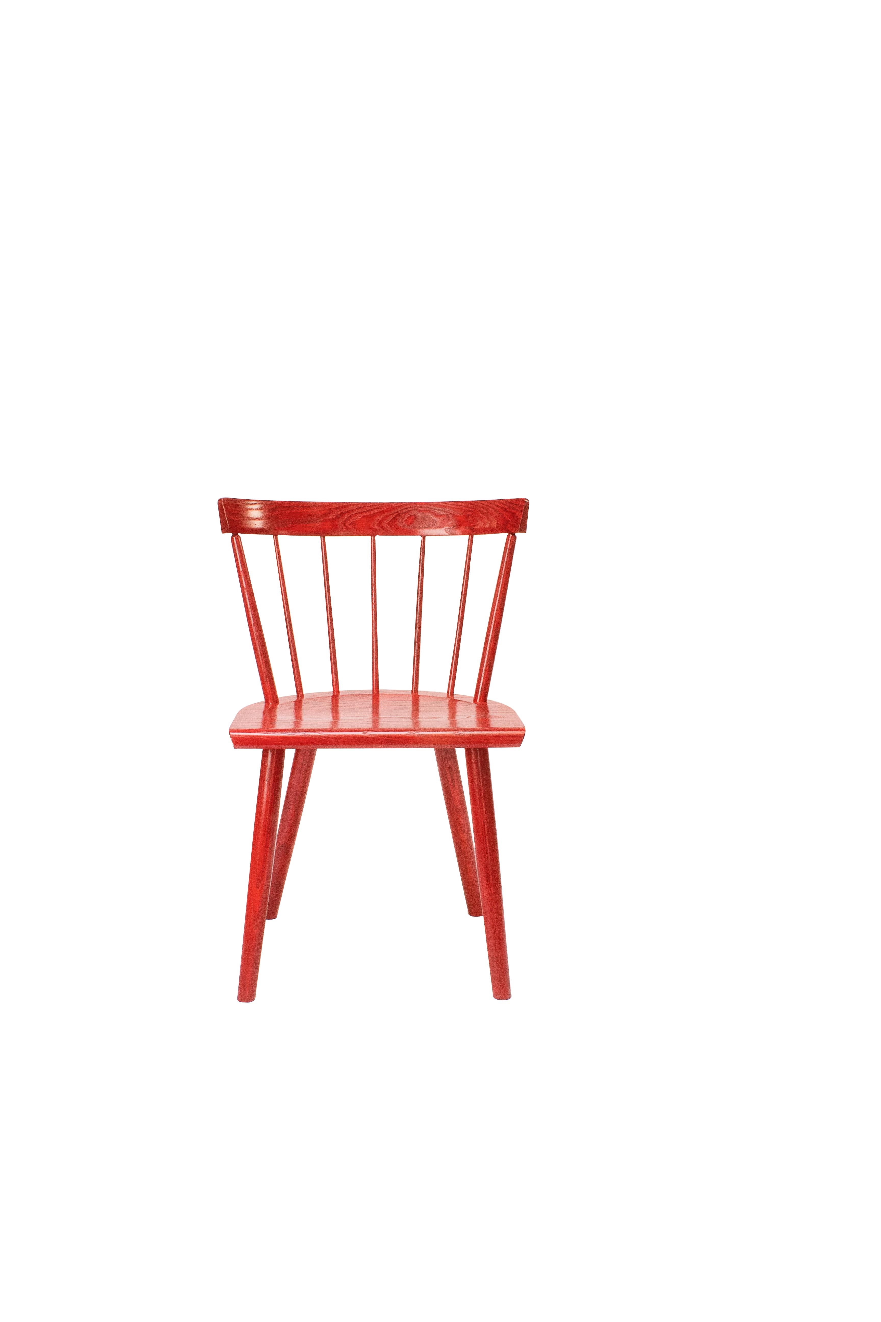 The Colt lowback side chair by O&G Studio is an iconic Modern Windsor chair, perfect in proportions, detail and comfort. The Colt Low Back is handmade in our Warren Rhode Island Studio from solid North American hardwood using time honored joinery