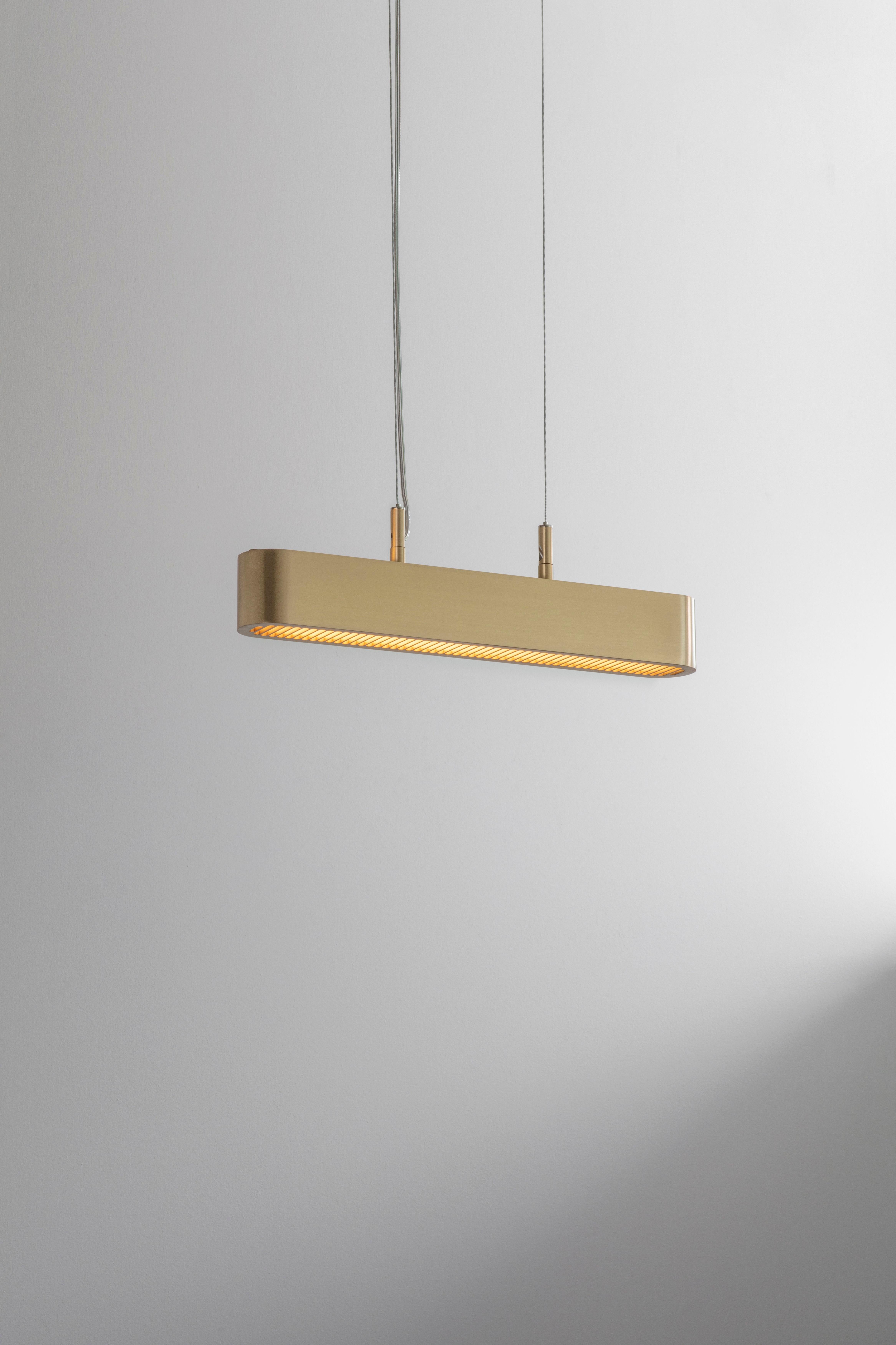 Colt pendant light single by Bert Frank
Dimensions: 9 x 6 x H 41 cm 
Materials: brass


All our lamps can be wired according to each country. If sold to the USA it will be wired for the USA for instance.

When Adam Yeats and Robbie Llewellyn