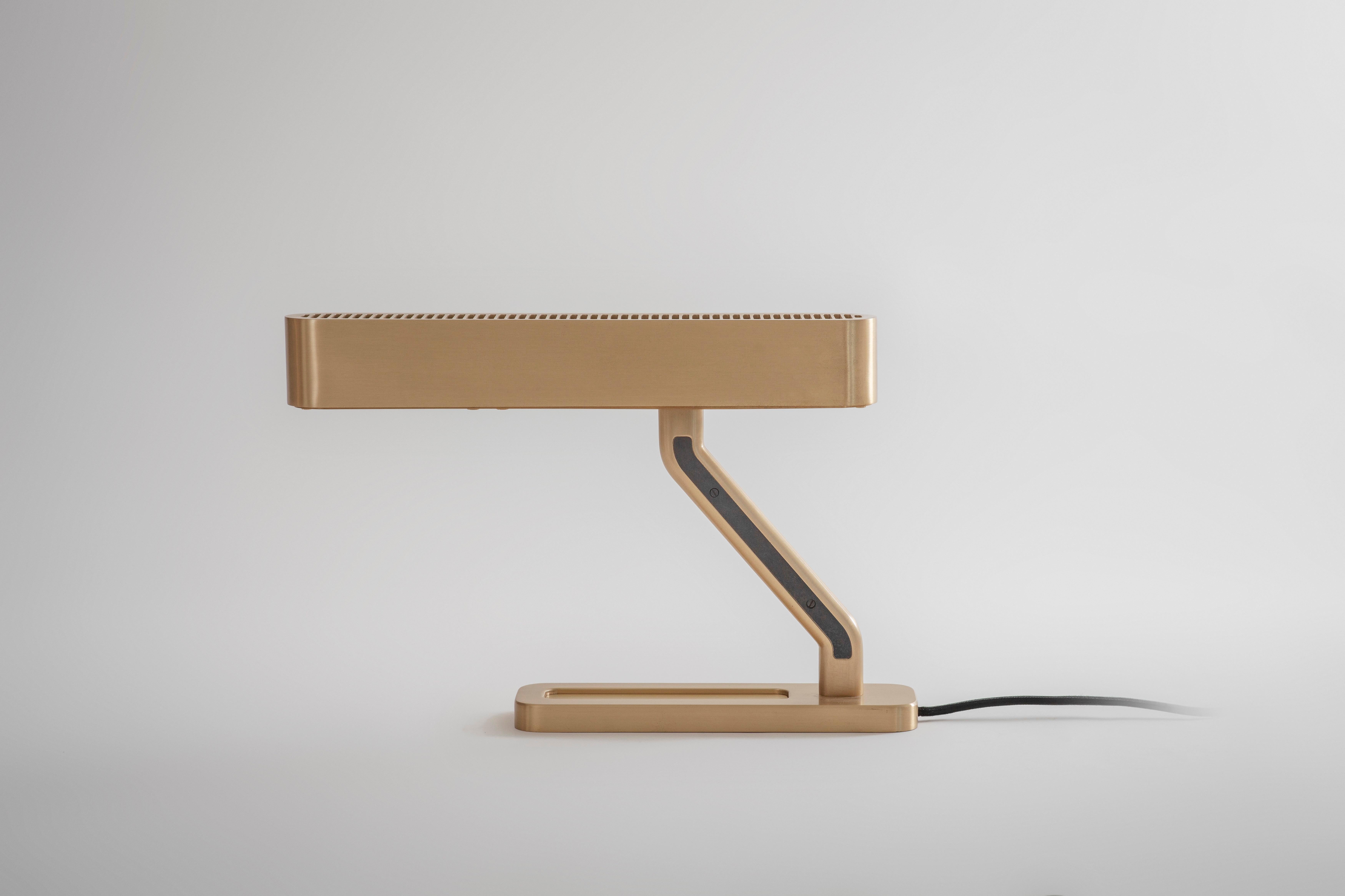 Colt table light by Bert Frank
Dimensions: 27.9 x 43 x 5.45 cm
Materials: Brass, bronze

Brushed brass lacquered as standard, custom finishes available.

When Adam Yeats and Robbie Llewellyn founded Bert Frank in 2013 it was a meeting of minds