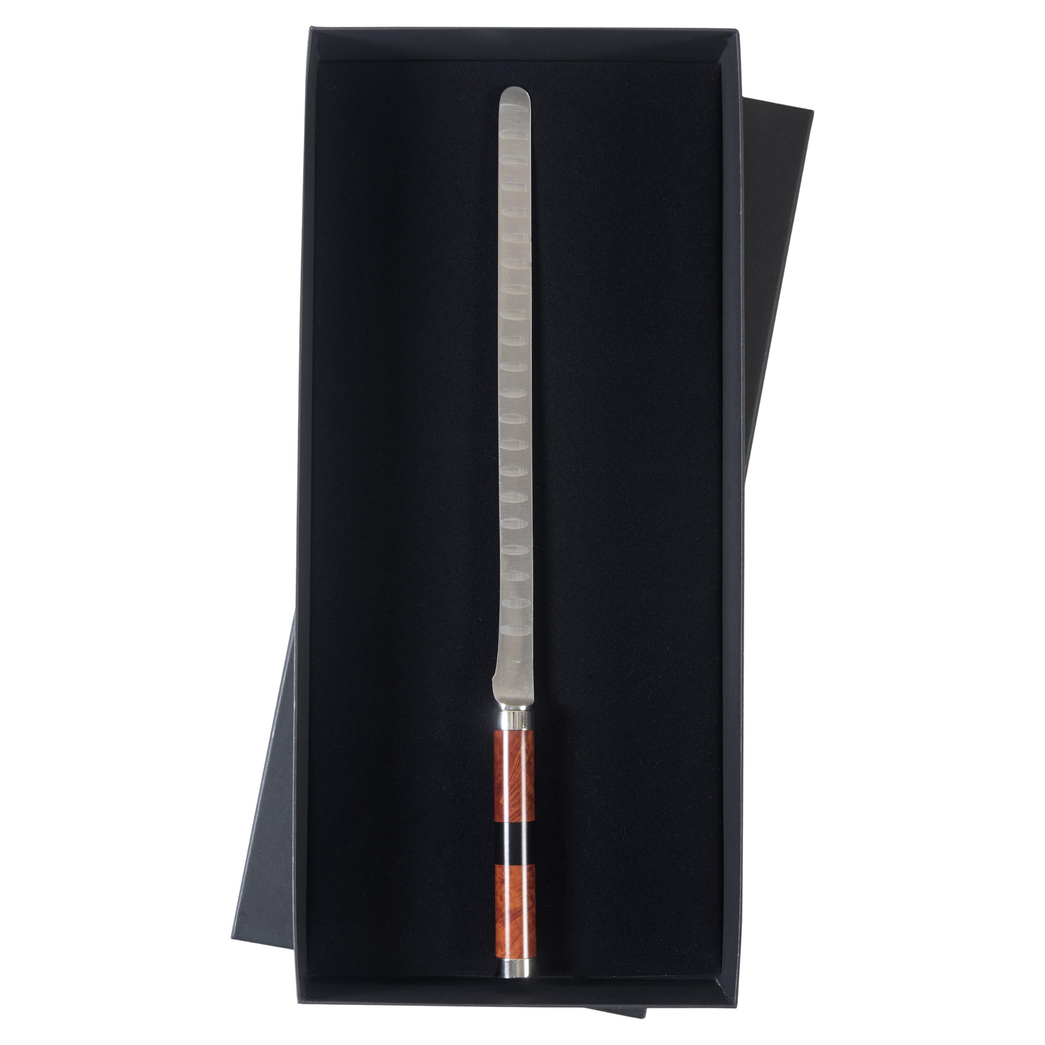 CUCHILLO SALMÓN Elegante accesorio de mesa de diseño moderno