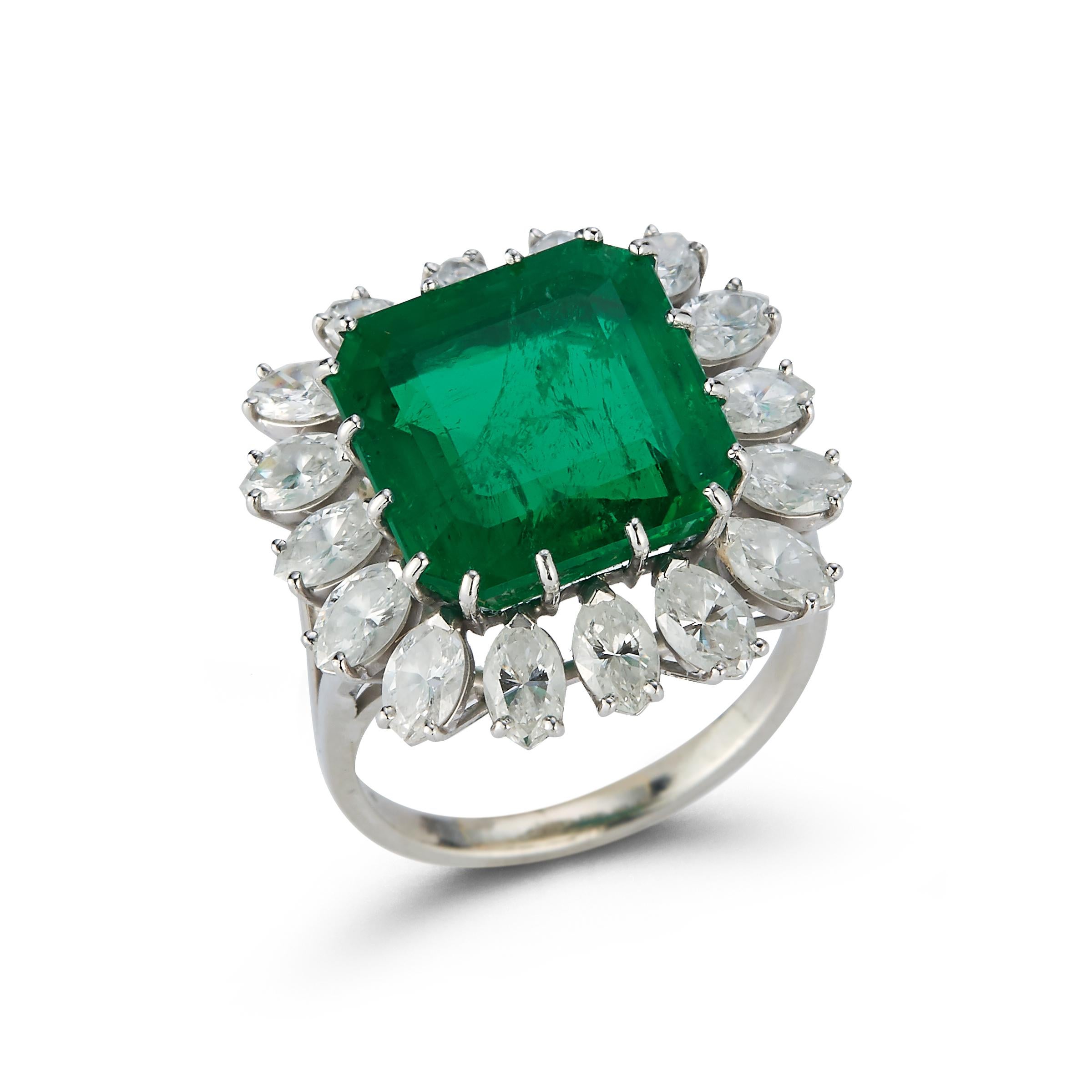 Estate Jewelry Curated by Parulina- This stunning 8.30ct Emerald is accented with approximately 3.00cts of Diamonds set in 18K White Gold. 
No oil treatment on Emerald.
Ring Size 6

Metal: 18K White Gold
Gemstone Carat Weight: 8.30ct Emerald
Diamond