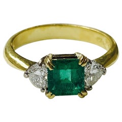 Emerald and Diamond Engagement Ring in 18 Karat White Gold