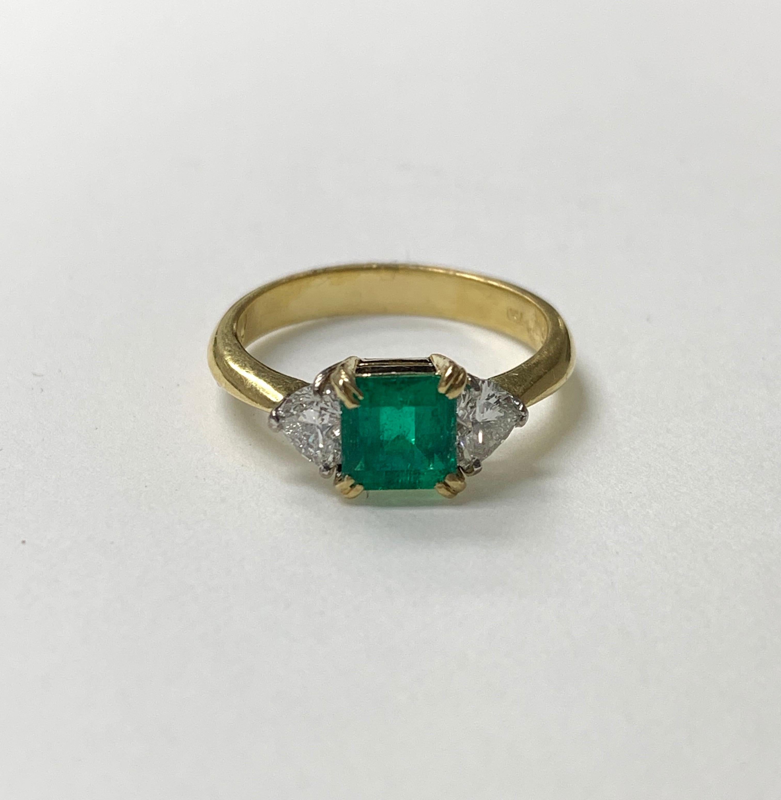 Very pretty emerald and diamond engagement ring is hand made in 18 k white gold. 
The details are as follows ; 
Emerald weight : 0.95 carat 
Diamond weight : 0.60 carat 
Ring size : 6 3/4 
Metal : 18 k white gold 

