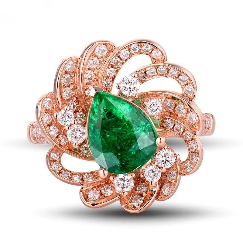
This 1.05 Columbian Emerald Ring stands out with  70 Diamonds including 2 sets on each side of band set in 18 Karat rose Gold  . If you want it in white or yellow gold do let us know too and this swirl design  will make a good impression.