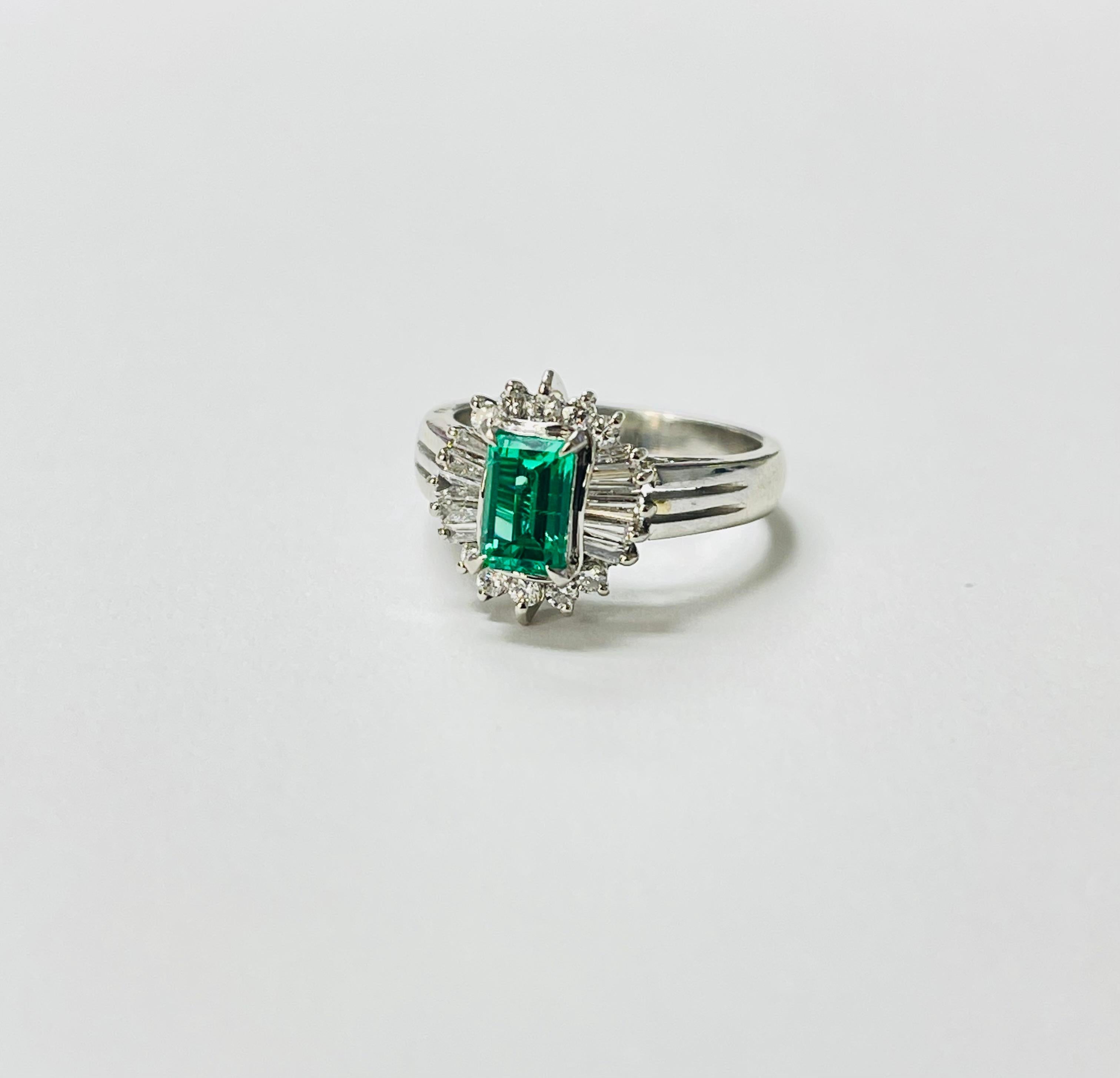 Contemporary Columbian Emerald Octagonal Step Cut And Diamond Engagement Ring In Platinum GIA For Sale