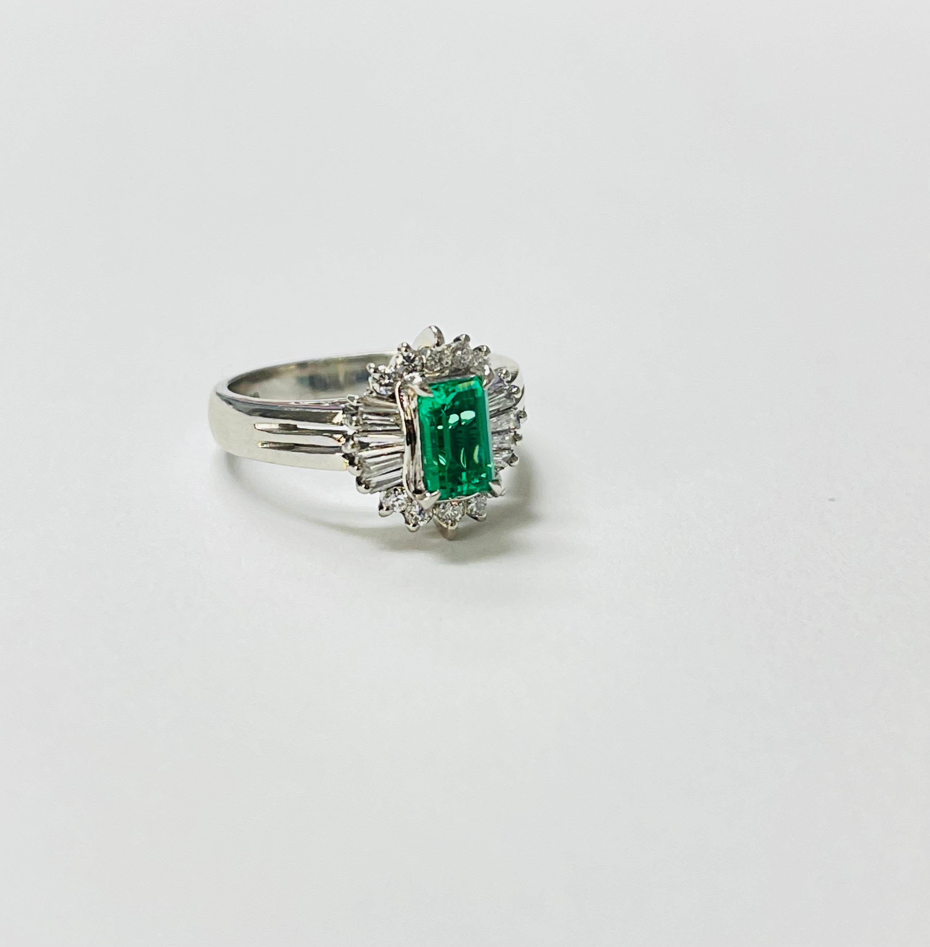 Emerald Cut Columbian Emerald Octagonal Step Cut And Diamond Engagement Ring In Platinum GIA For Sale