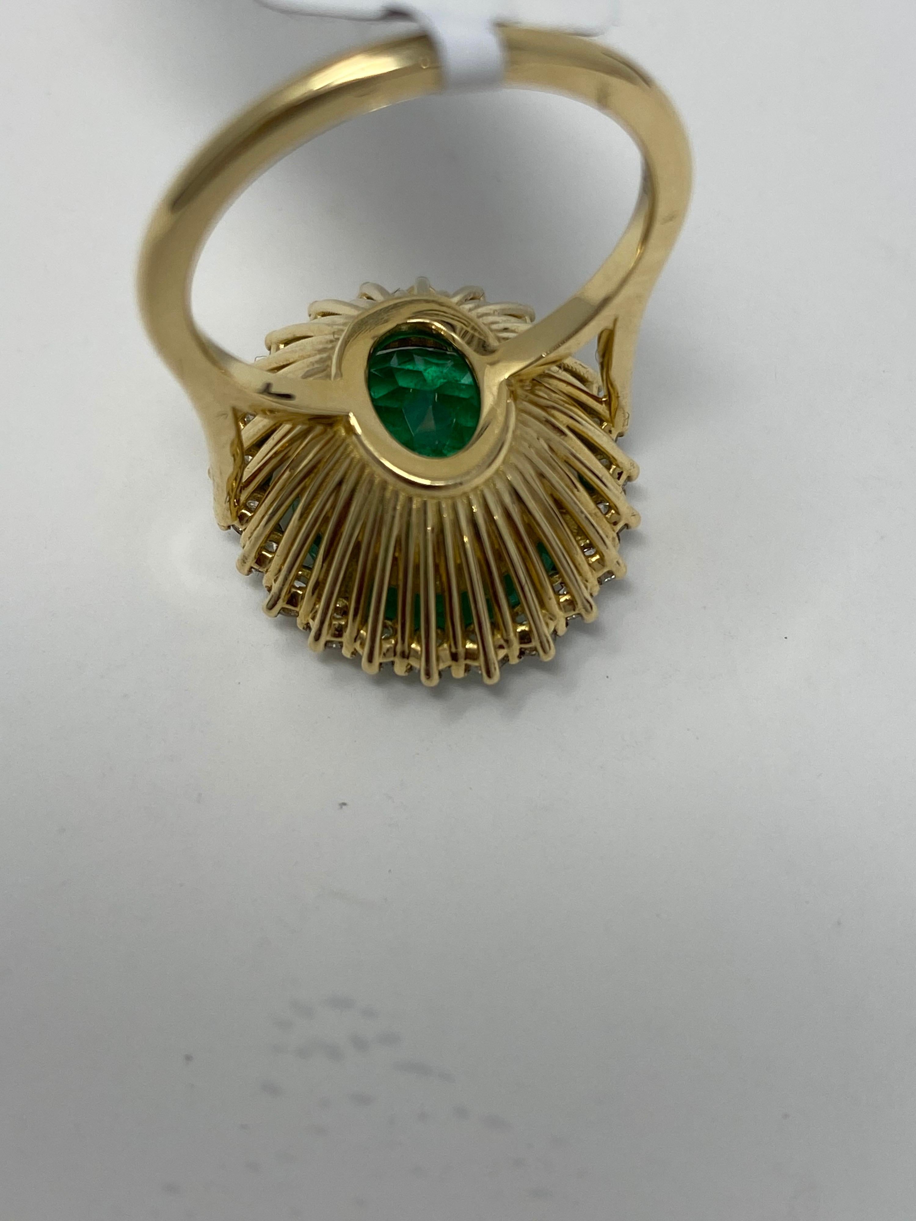 Columbian Emerald and Diamonds Halo Ring. Emerald is oval shaped 7.64 ct with 1.00ct of diamonds. Set in 18 kt yellow gold. Total weight of ring is 8.40gm. Full appraisal and GIA report included. Appraised at $42,500.  Absolutely gorgeous ring.