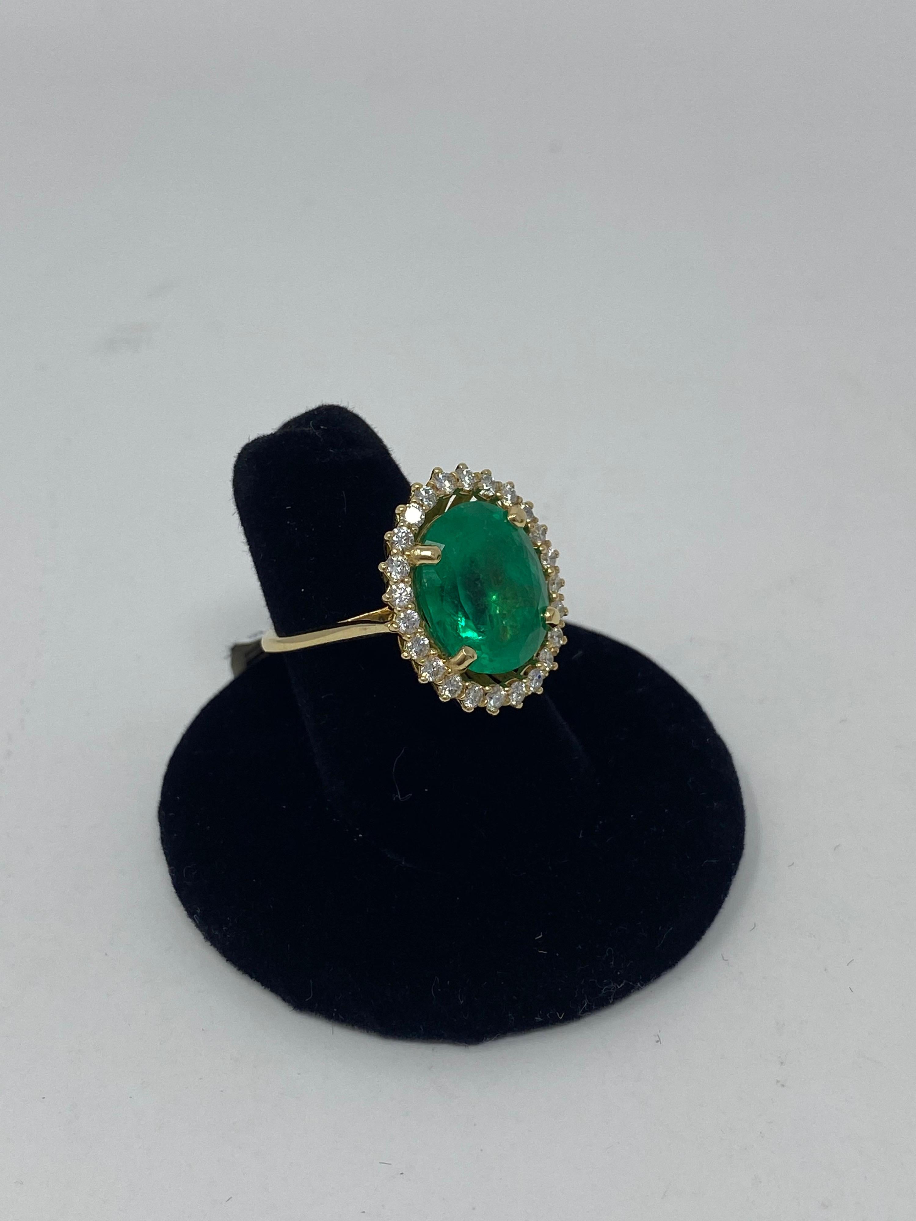 Columbian Emerald Ring with Diamonds Halo In Excellent Condition In Athens, GA