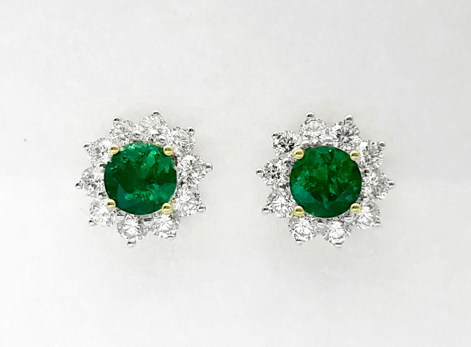 Contemporary Columbian Emerald with Diamond Earrings set in 18K Gold Settings For Sale