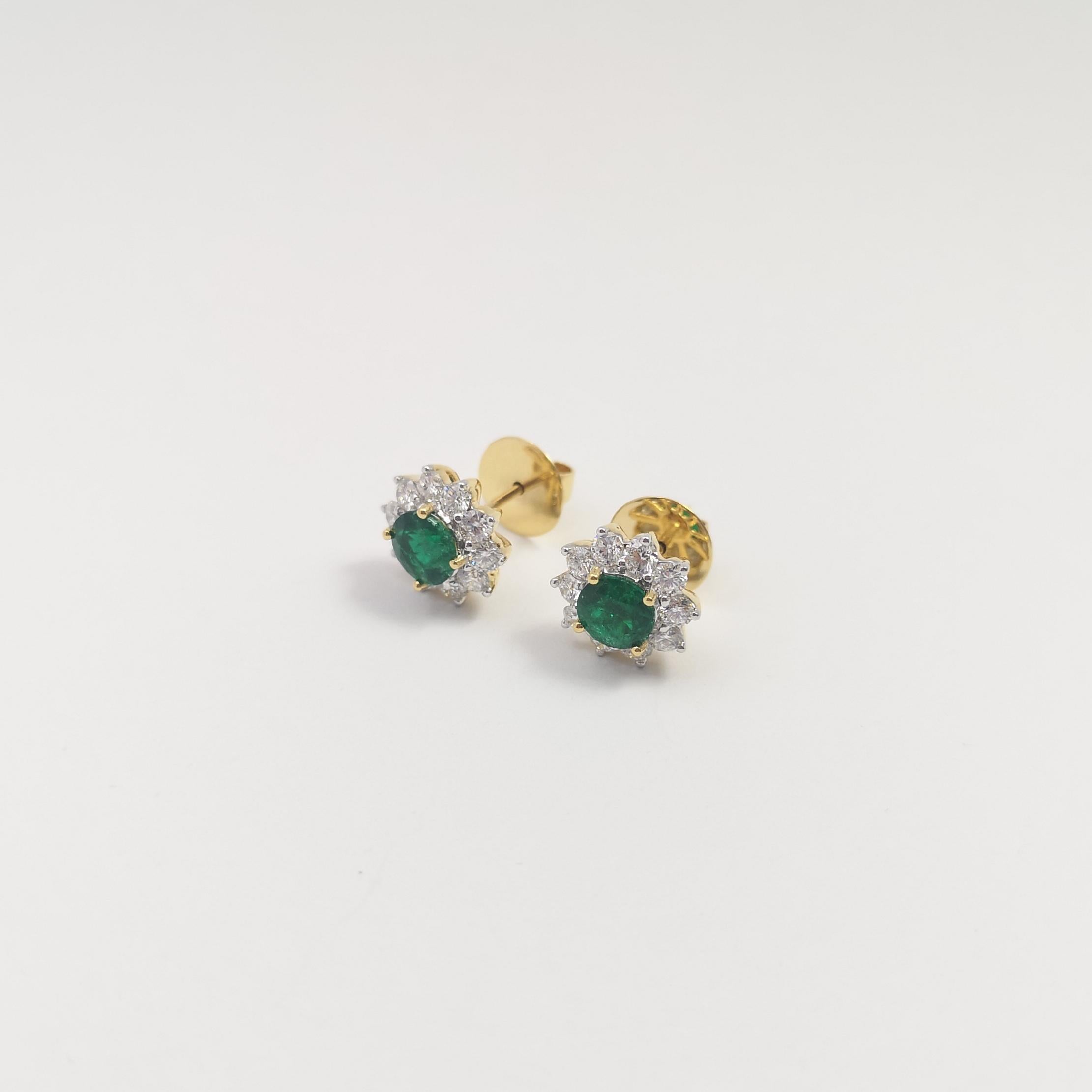 Women's Columbian Emerald with Diamond Earrings set in 18K Gold Settings For Sale
