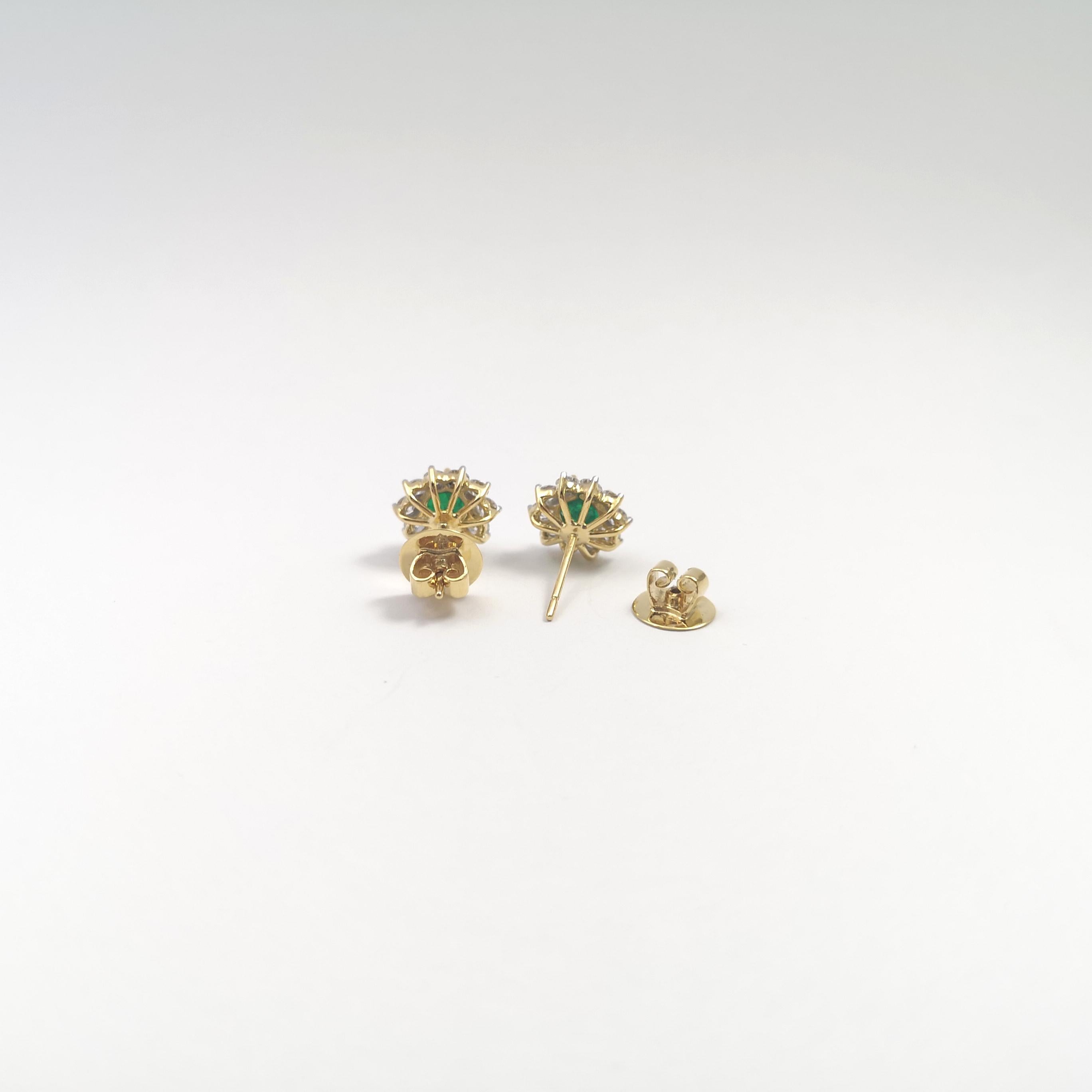 Columbian Emerald with Diamond Earrings set in 18K Gold Settings For Sale 2