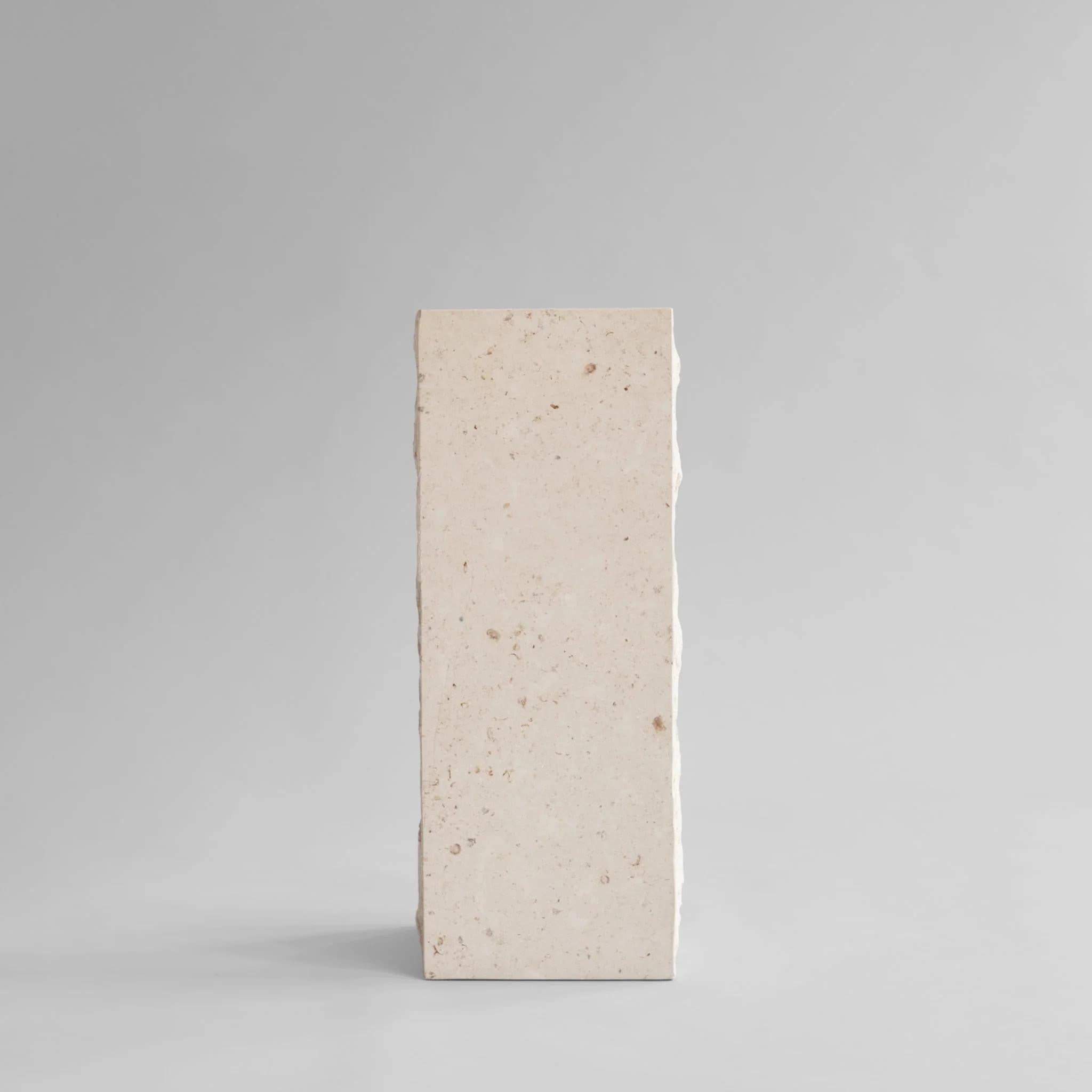 Column, limestone sheath, contemporary work.

This column is made of limestone, in the style of a contemporary sculpture.
The podium can be placed horizontally or vertically. 
Available in three different heights, the podium can also be used as a