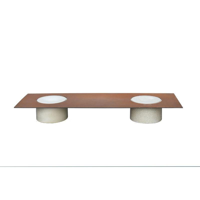Column low table by WL CERAMICS
Design: David Derksen
Materials: Porcelain with effect glaze, corten steel
Dimensions: 20 x 30 (Ceramic), 150 x 50 x 20 cm

Also available: column side table.

Porcelain cylinders and corten steel plates form