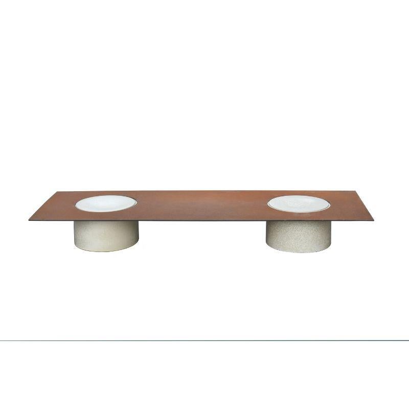 Column low table by WL Ceramics
Design: David Derksen
Materials: Porcelain with effect glaze, corten steel
Dimensions: 20 x 30 (Ceramic), 150 x 50 x 20 cm

Also available: column side table.

Porcelain cylinders and corten steel plates form