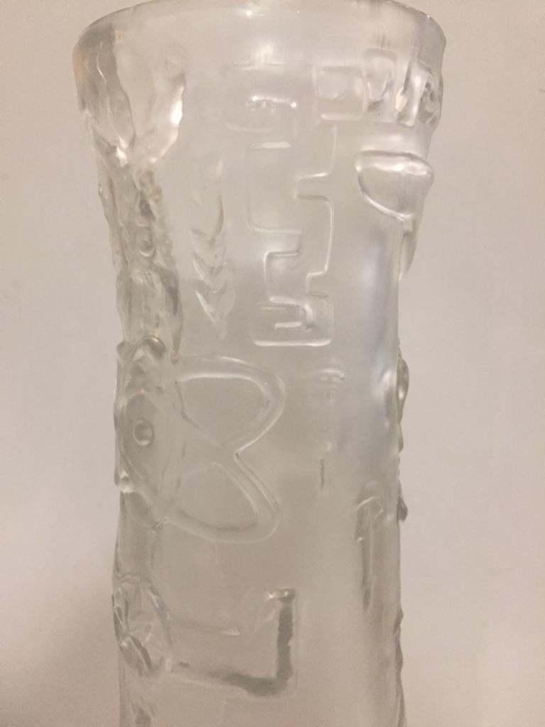 Striking glass flower vase by Austrian manufacturer Riedel after the famous central column of the National Museum of Anthropology in Mexico city. The Riedel seal can be seen on the bottom of the flower vase. This vase was manufactured in Austria for