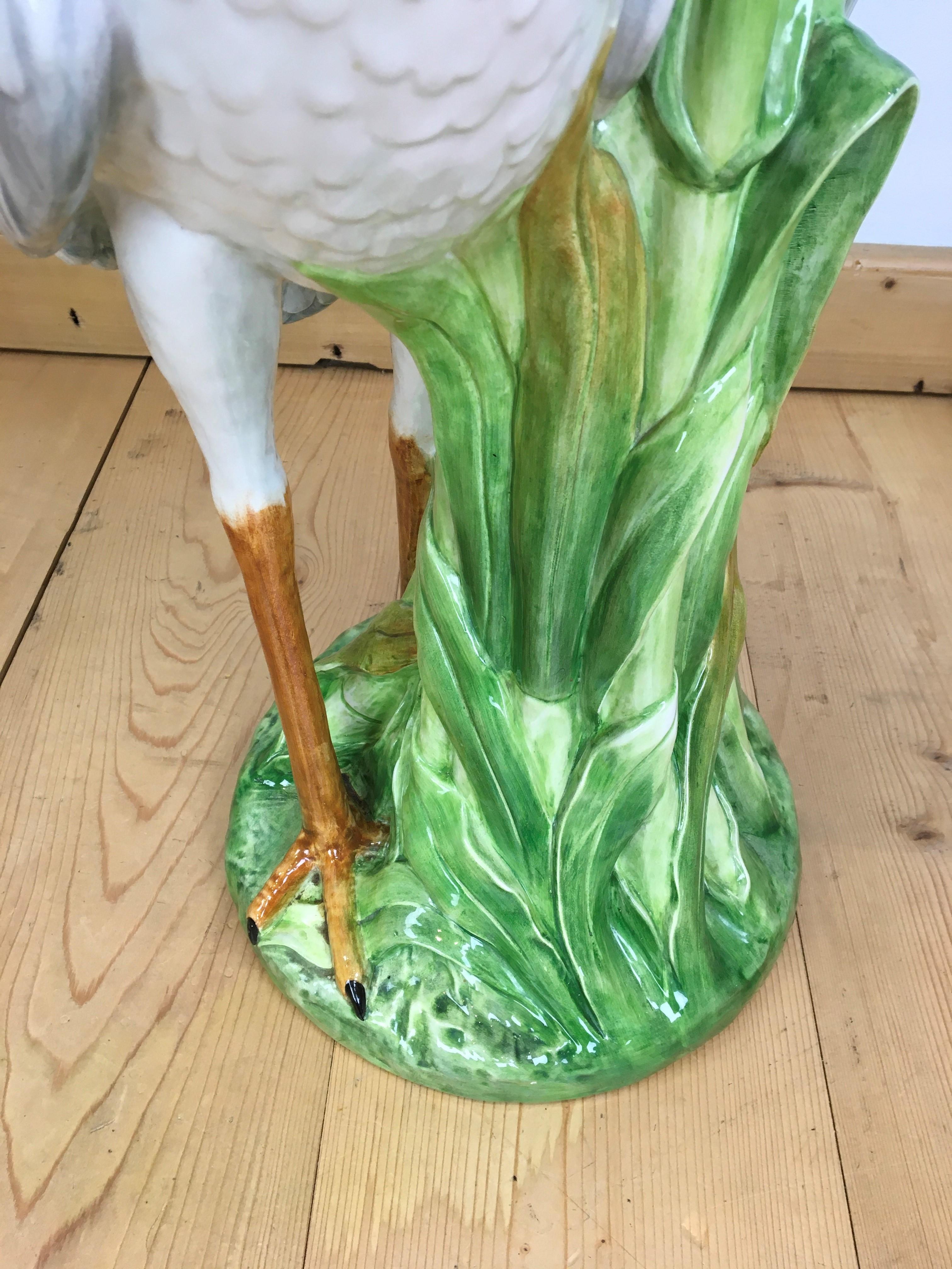 Säulensäule mit Heron und Pflanzgefäß, Italien (Keramik)