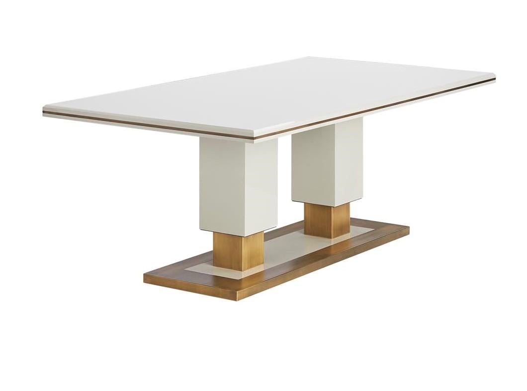 Eclectic and very elegant, this dining table embraces sensuality in decoration, combining lacquer finish with metal details, keeping the balanced design.

Glossy lacquered top and legs in S2005-Y20R, combined with antique brass base and