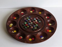 Combination Board Game of large Marble Solitaire and Tiddlywinks, circa 1925