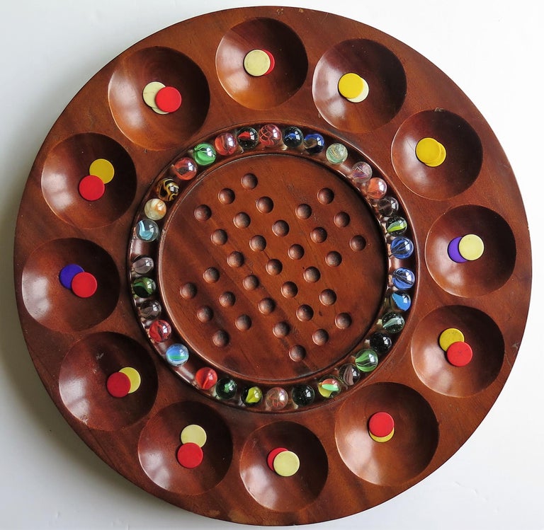 Combination Board Game of Marble Solitaire and Tiddlywinks, circa 1925