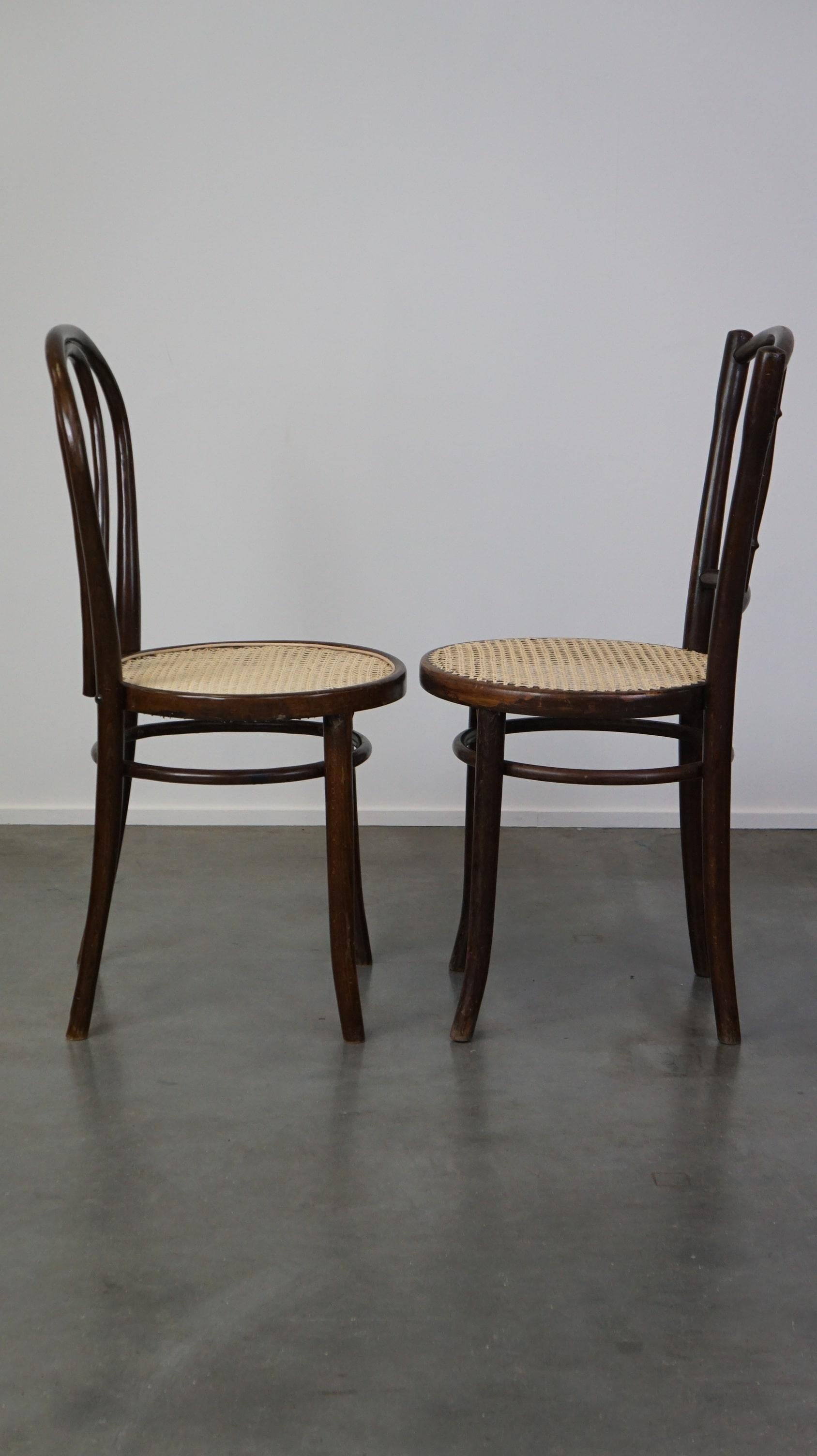 20th Century Combined set of 4 original antique Thonet bistro chairs with new seats For Sale