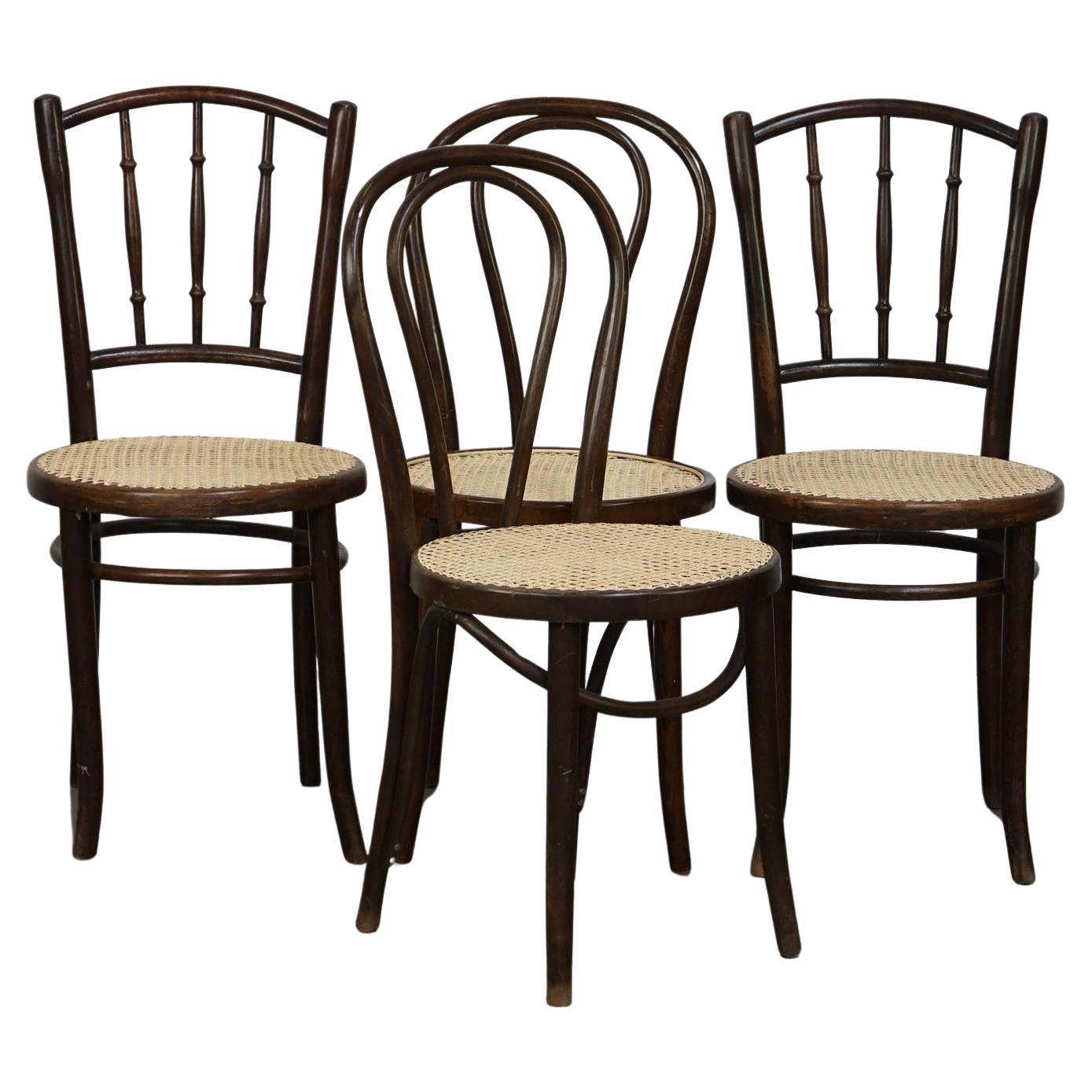 Combined set of 4 original antique Thonet bistro chairs with new seats For Sale