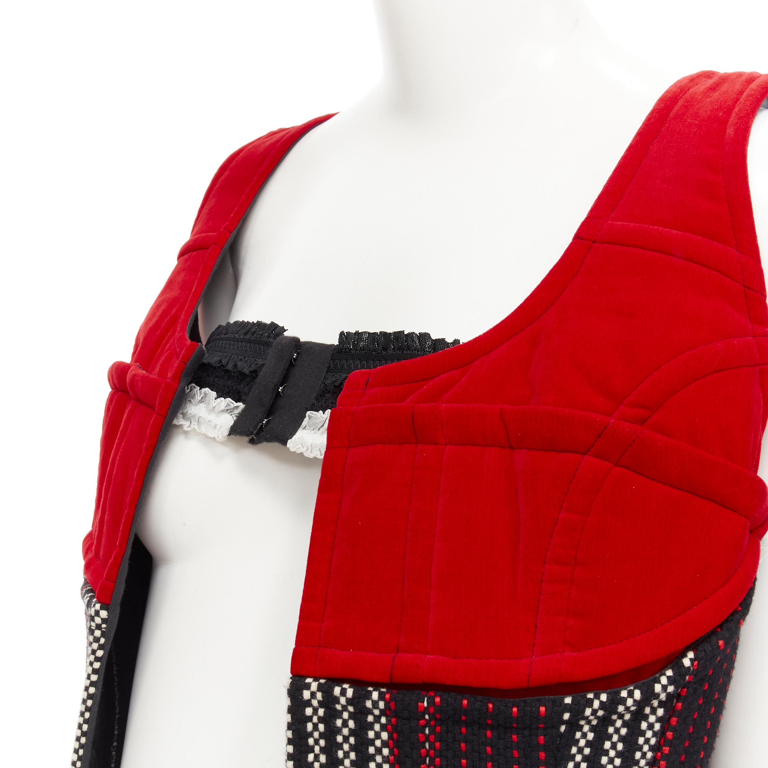 COME DES GARCONS 2001 Runway Vintage red velvet tweed deconstructed corset S 
Reference: CRTI/A00627 
Brand: Comme Des Garcons 
Designer: Rei Kawakubo 
Collection: 2001 Runway 
Material: Velvet 
Color: Red 
Pattern: Abstract 
Extra Detail: