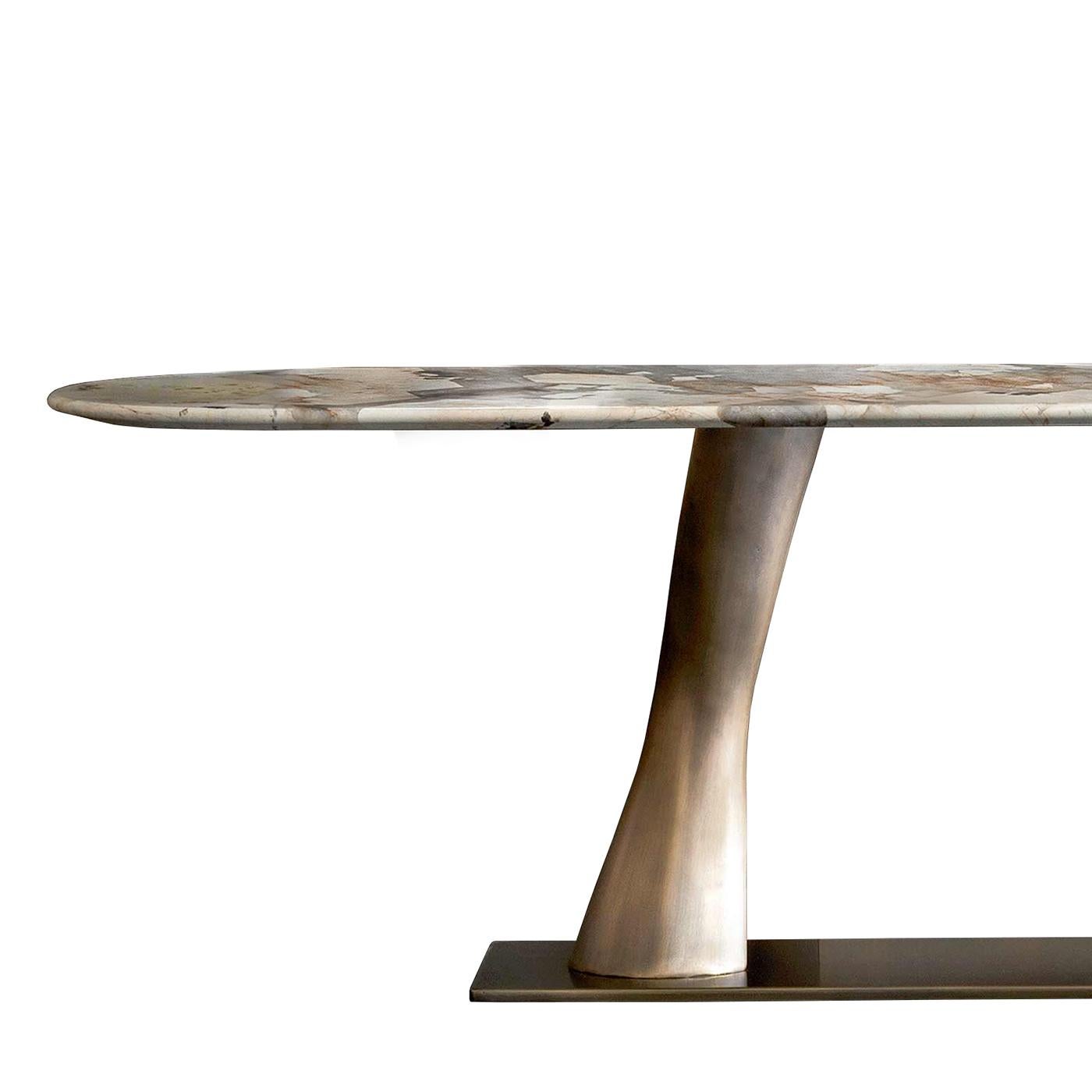 Console table comet marble with solid bronze base
with 2 twisted bronze feet. With long oval patagonia
marble top, high marble quality. 
Exceptional piece, each marble top is unique.
Also available with long oval Emperador marble top,
price: