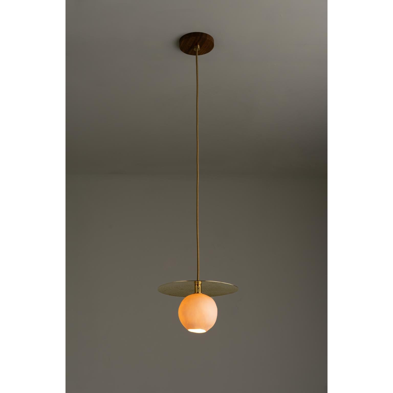 Cometa Modern Brass and Glass Pendant Light by Isabel Moncada
Dimensions: D 30 x H 100 cm.
Materials: Brass, Glass.

Available in different colored blown glass globes. All our lamps can be wired according to each country. If sold to the USA it will