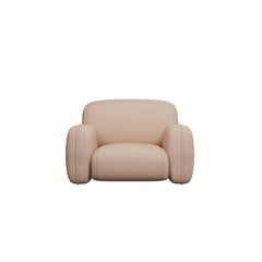 Comfort armchair Savan in Easy Clean Coral Fabric handcrafted by Murmurio