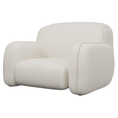 Comfort armchair Savan in Easy Clean Cream Fabric handcrafted by Murmurio