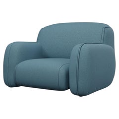 Comfort armchair Savan in Easy Clean Denim Fabric handcrafted by Murmurio