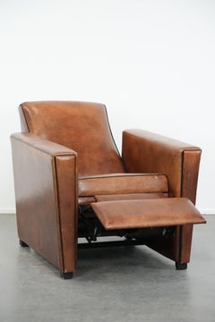 Comfortable and adjustable sheepskin relax armchair with a sleek design
