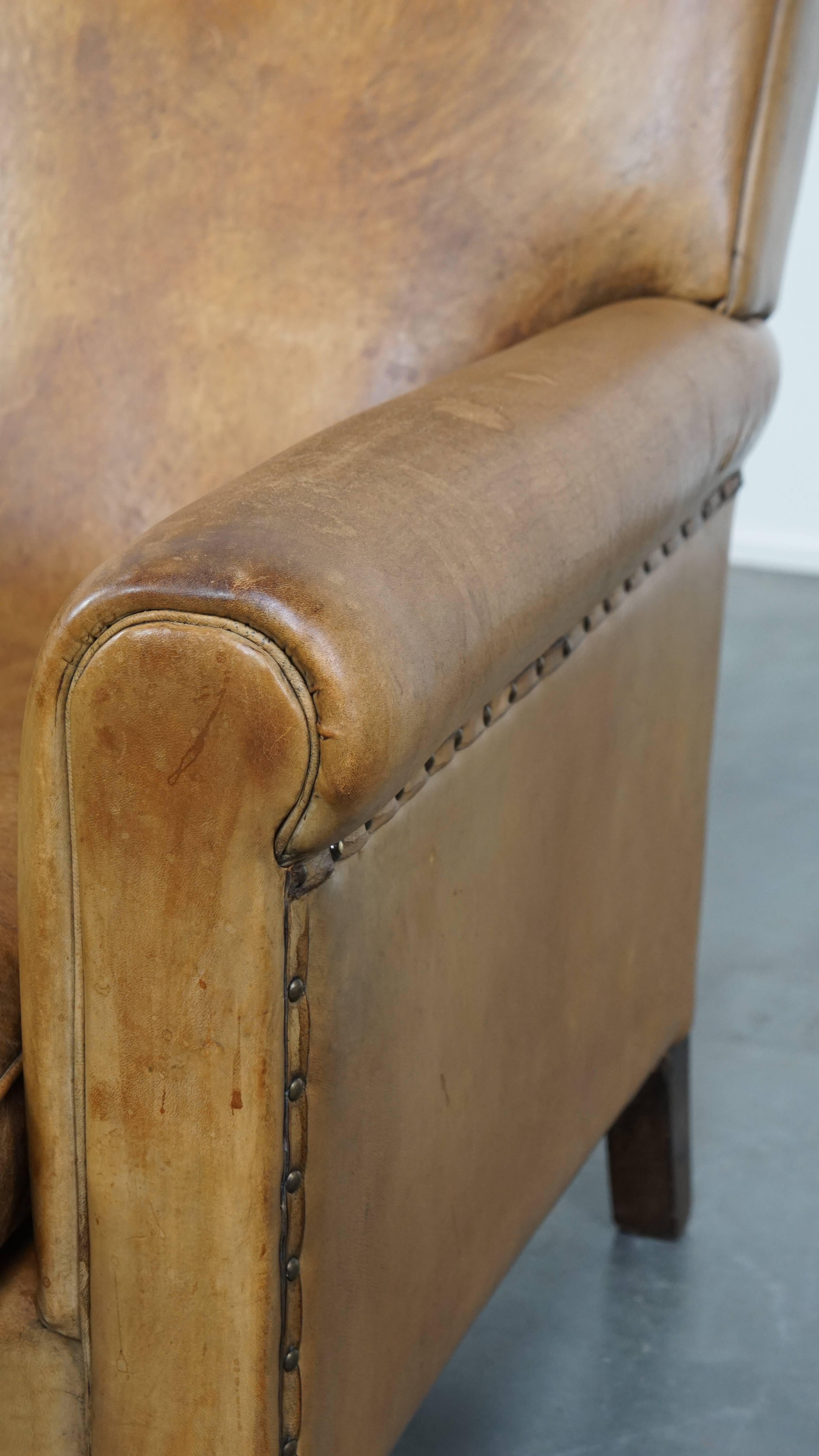 Comfortable and stylish vintage sheepskin leather armchair For Sale 3
