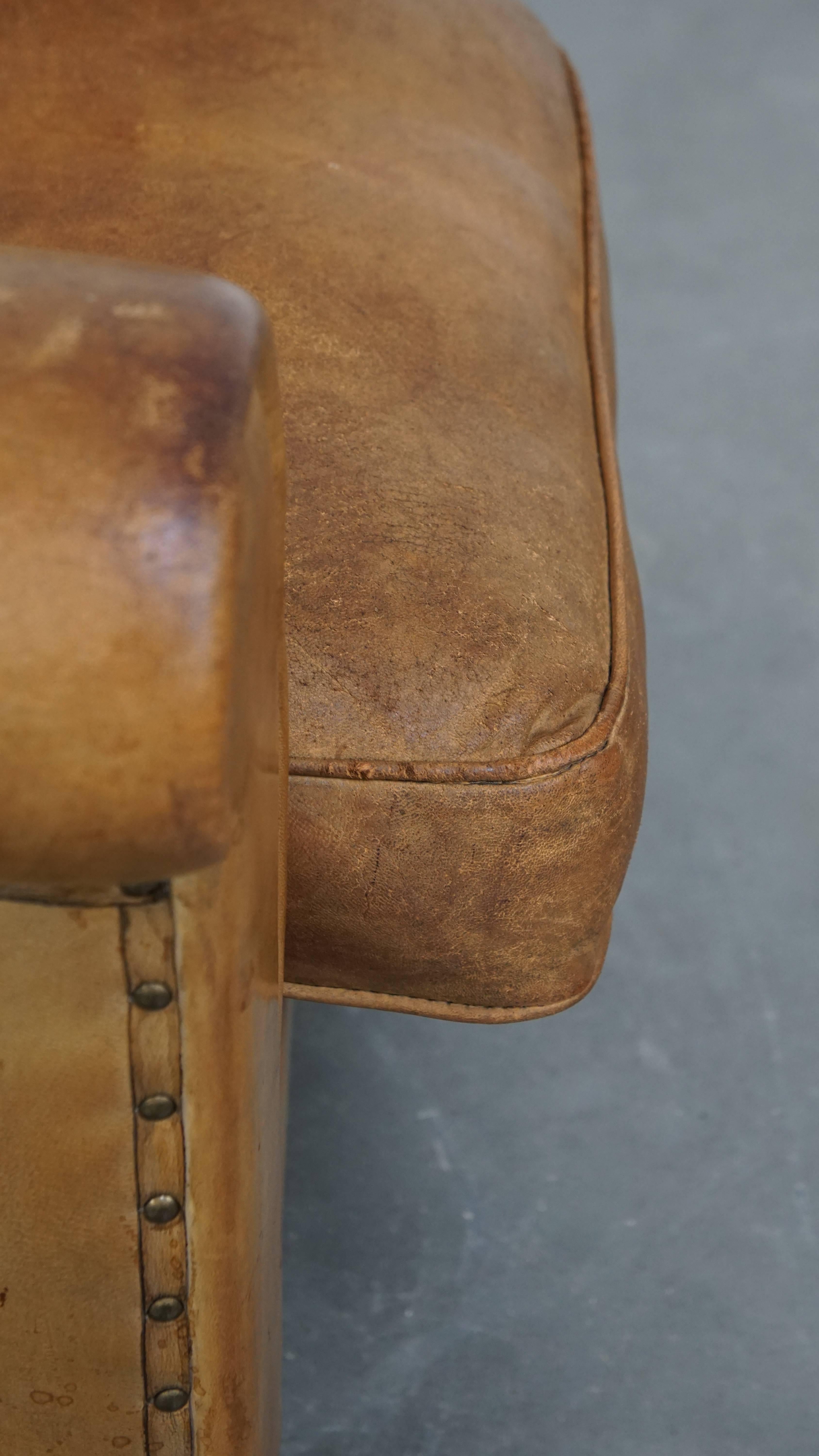 Comfortable and stylish vintage sheepskin leather armchair For Sale 4