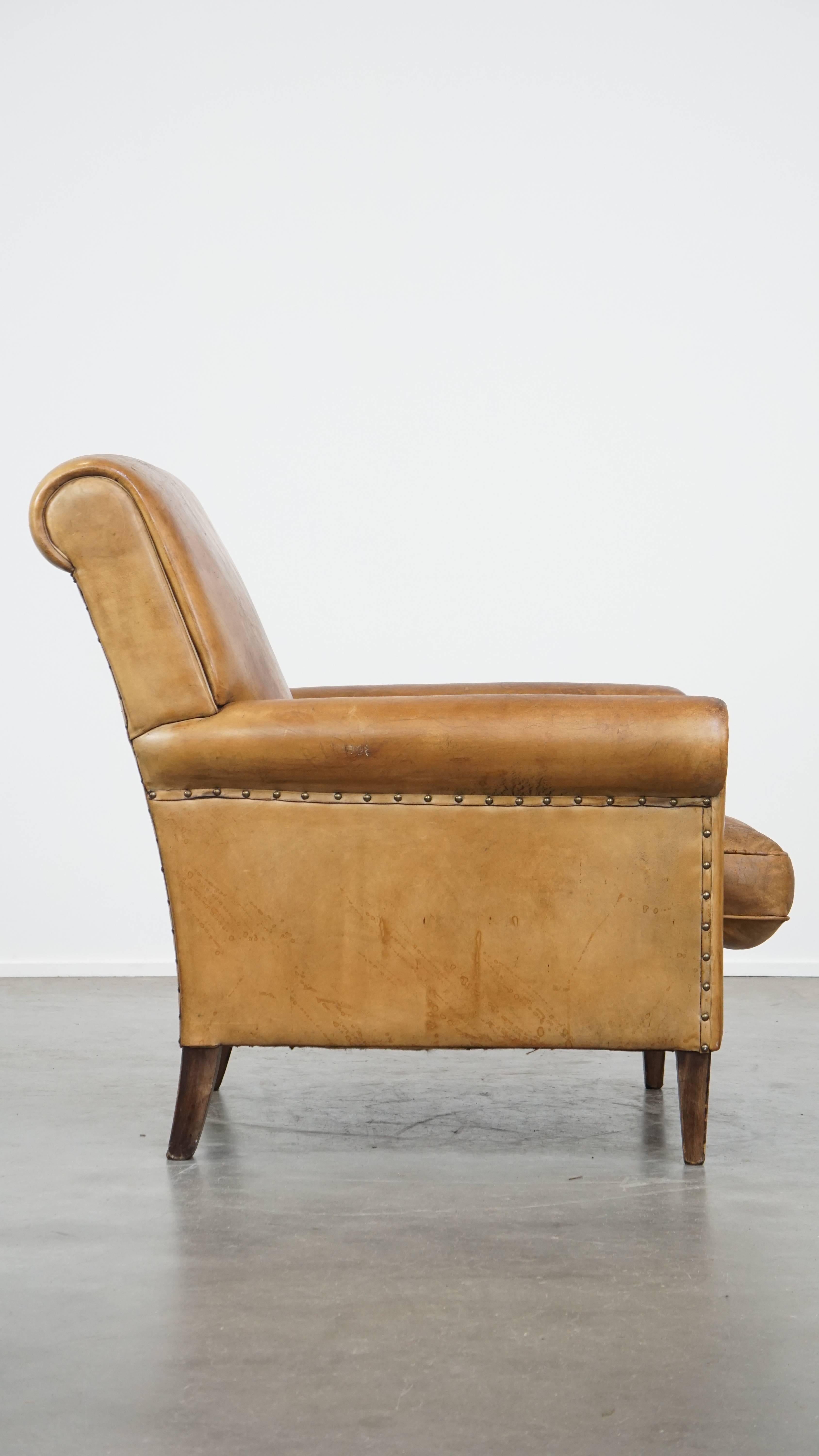 Classical Roman Comfortable and stylish vintage sheepskin leather armchair For Sale