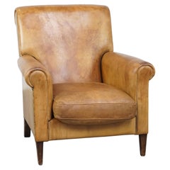 Comfortable and stylish vintage sheepskin leather armchair