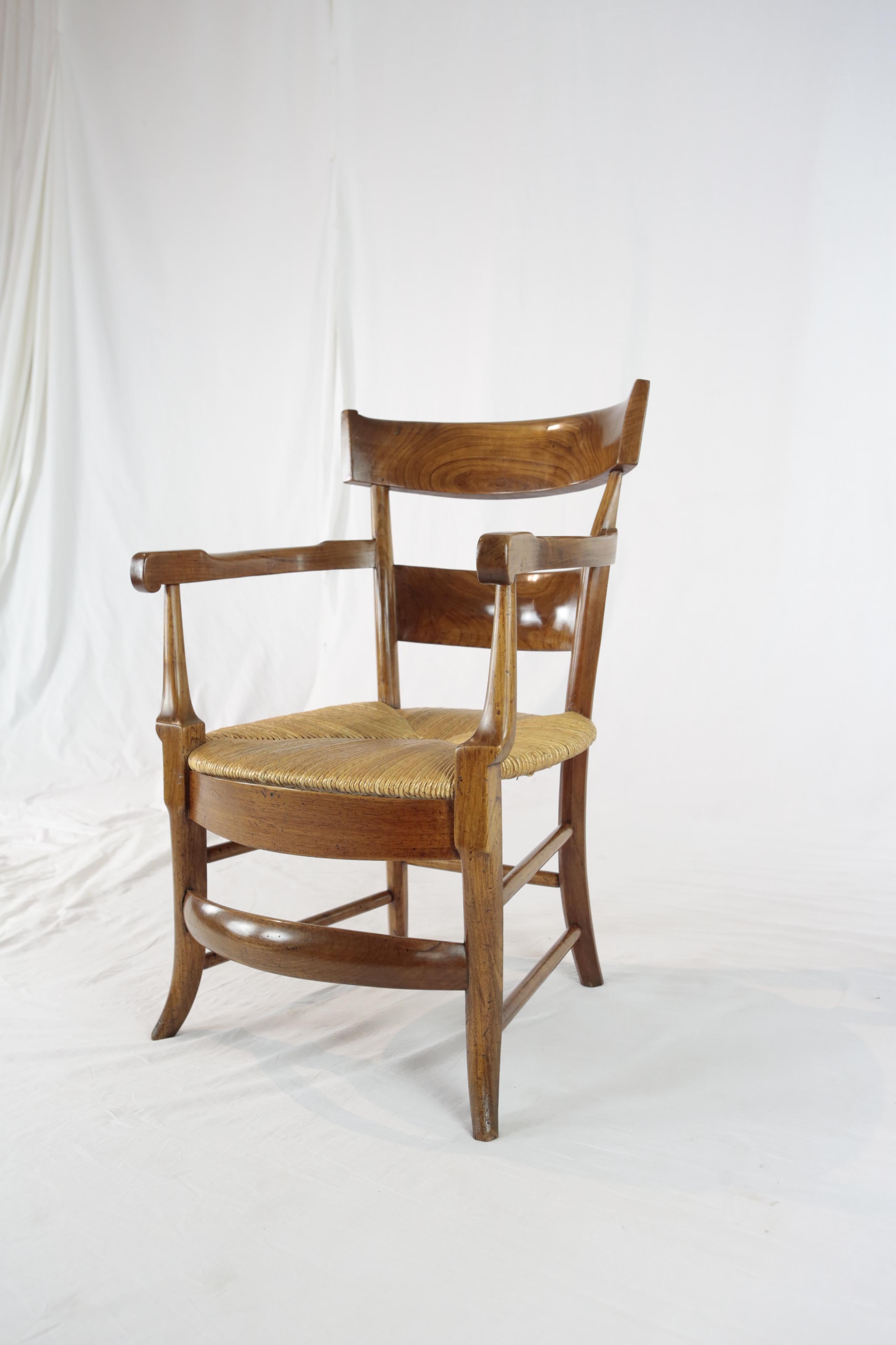 A characterful armchair made of solid cherrywood with beautiful grain and seat with rush wickerwork. The slightly curved backrest and the wide seat offer a good seating comfort. The simple and rustic country house chic fit into many interiors.
The