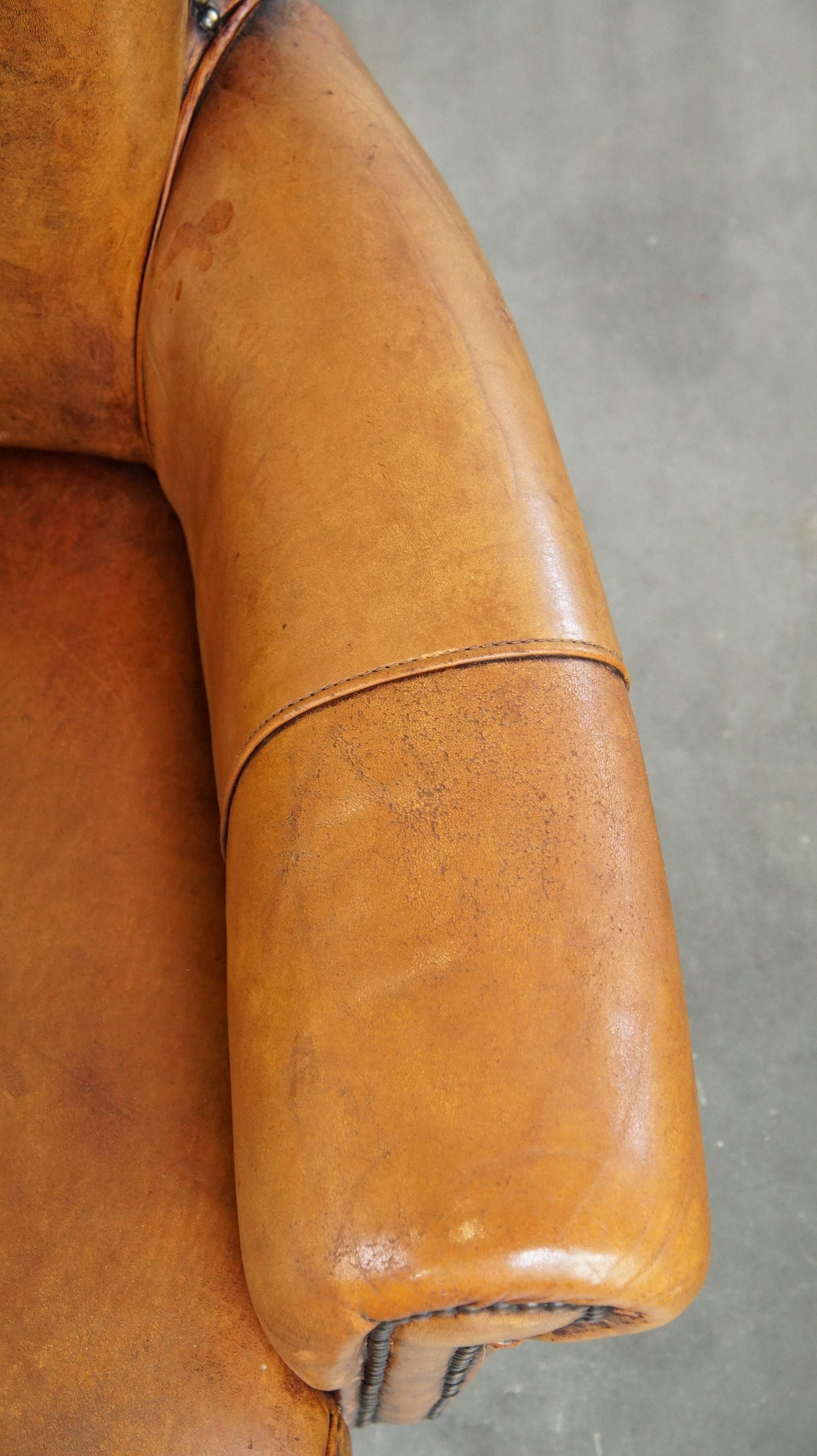 Comfortable armchair made of sheepskin leather finished with decorative nails For Sale 2