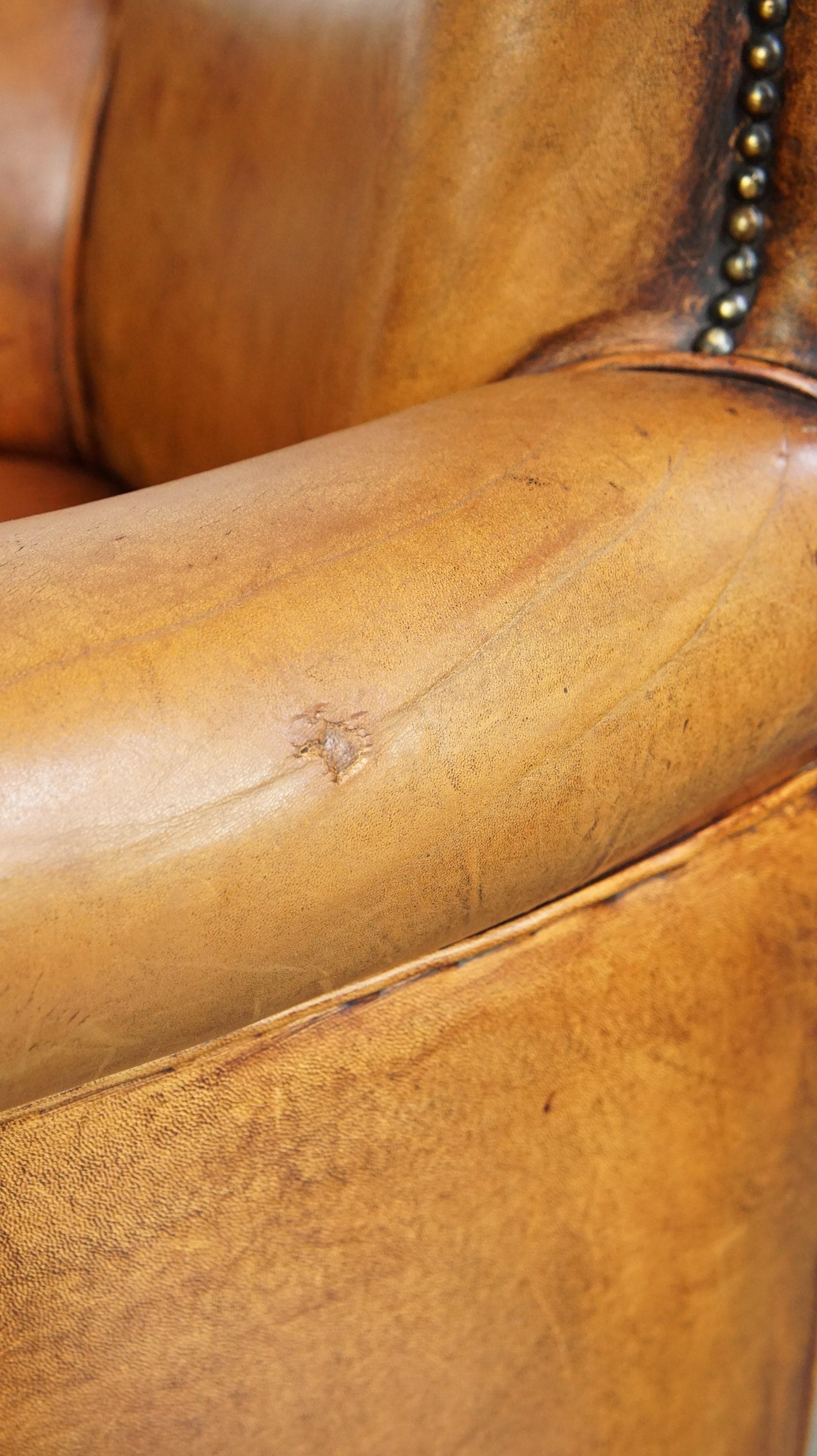 Comfortable armchair made of sheepskin leather finished with decorative nails For Sale 3