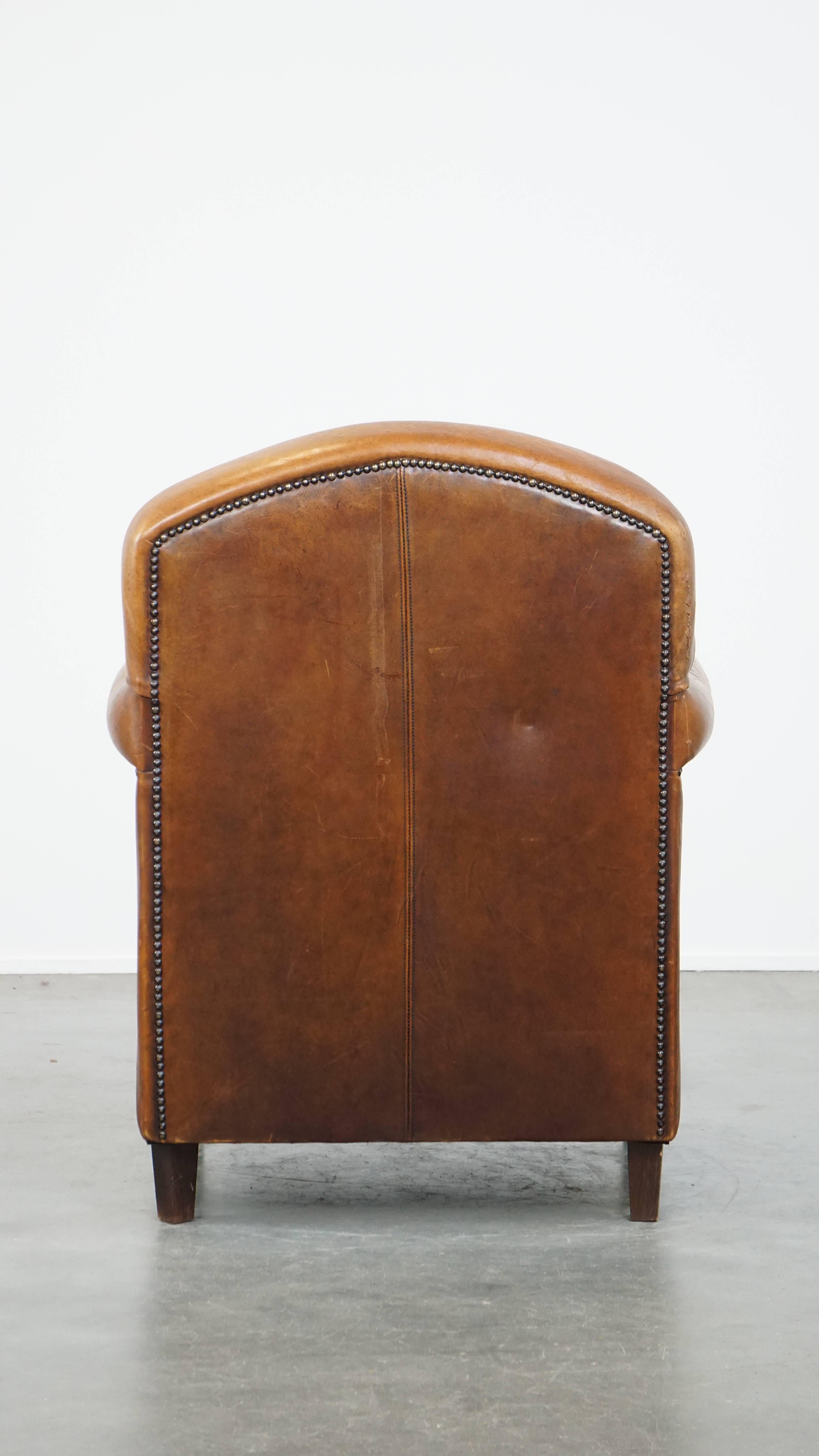 Comfortable Characteristic Sheepskin Leather Armchair with a Stunning Patina For Sale 4