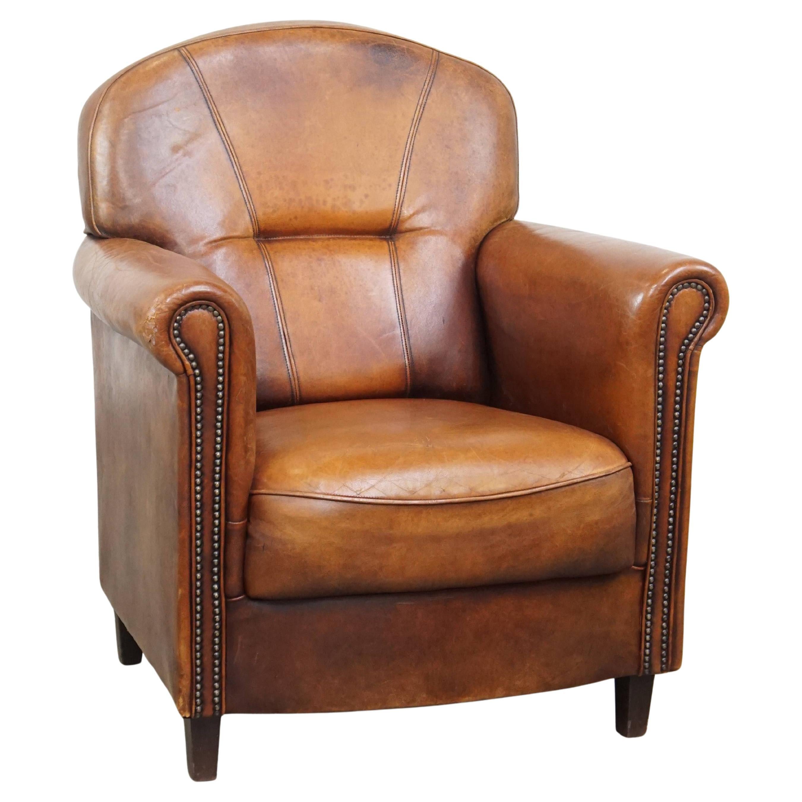 Comfortable Characteristic Sheepskin Leather Armchair with a Stunning Patina