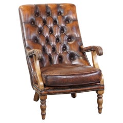 Comfortable, classic, beautifully colored English leather chesterfield armchair