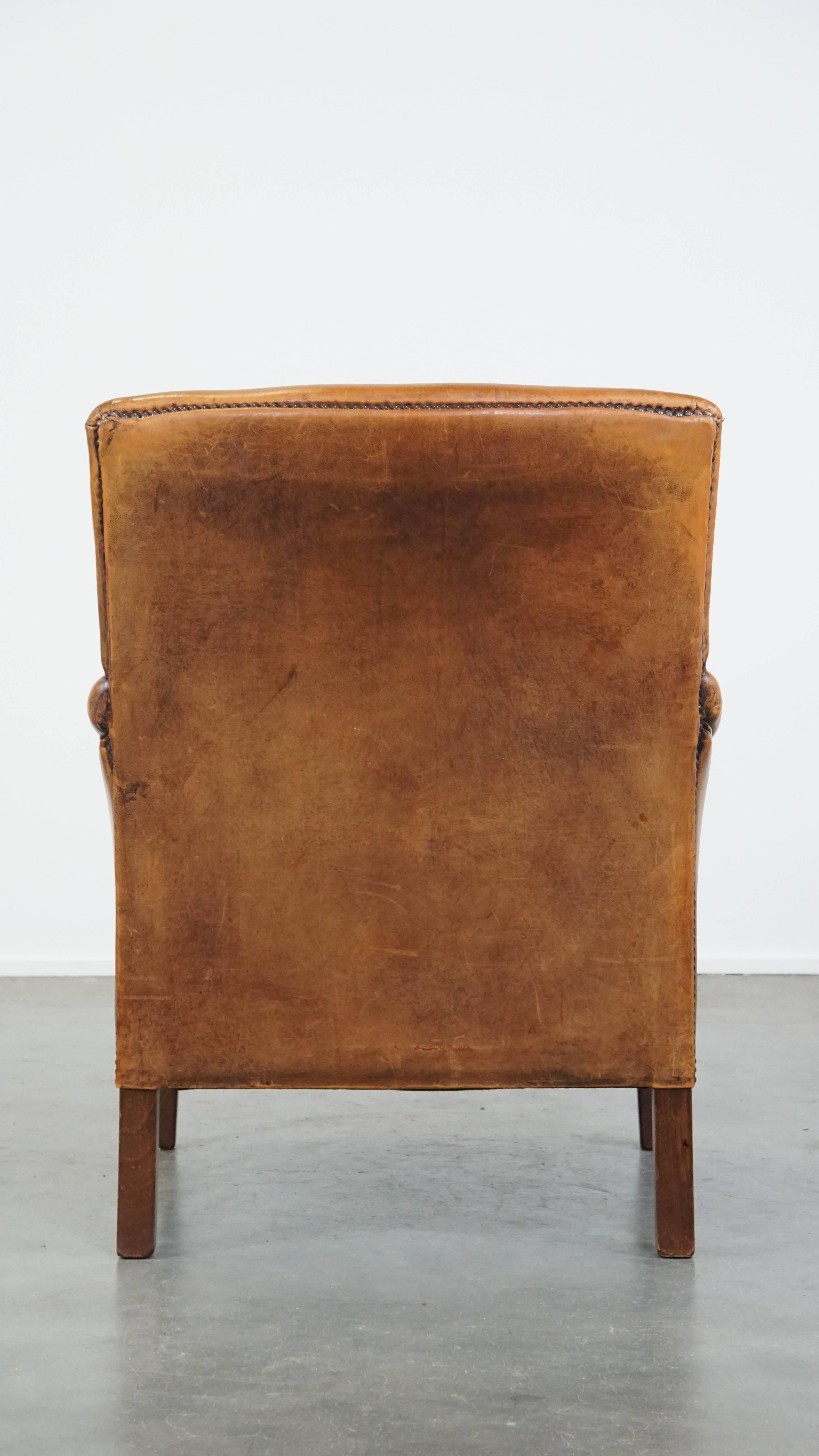 Hand-Crafted Comfortable Cognac-Colored Sheepskin Leather Armchair with Straight Lines For Sale