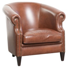 Fauteuil club confortable en cuir de vachette couleur cognac, de style anglais