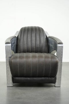 Comfortable cow leather aviator design armchair finished with aluminium