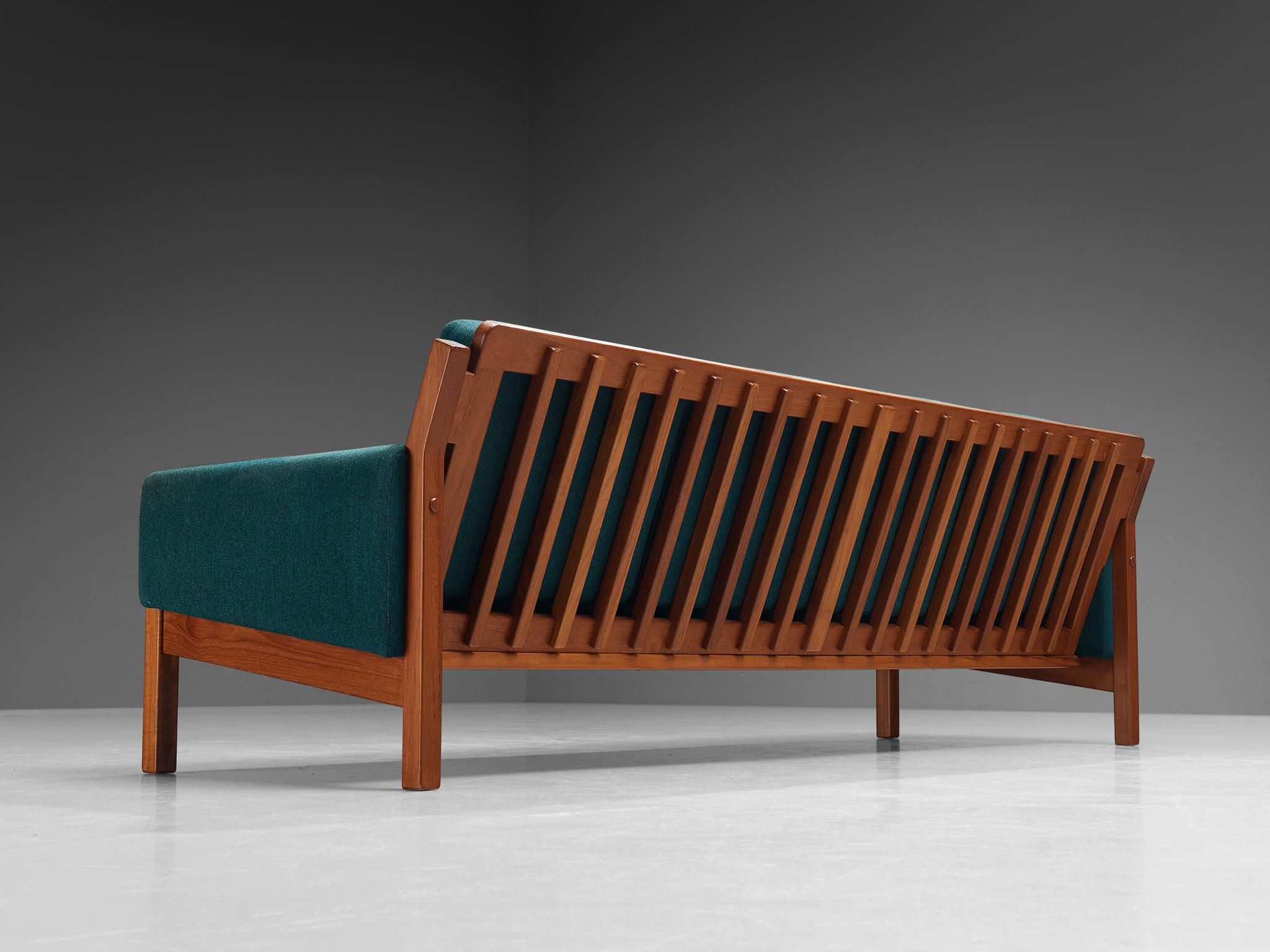 Sofa, blue fabric, wood, Denmark, 1950s

Stunning four seat sofa made in Denmark around the 1950s. Grand in size, this sofa is not only beautiful in its simplistic shape, it furthermore provides for great comfort. Due to the wooden slats that are