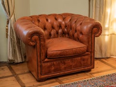 Confortevole poltrona Chesterfield in pelle